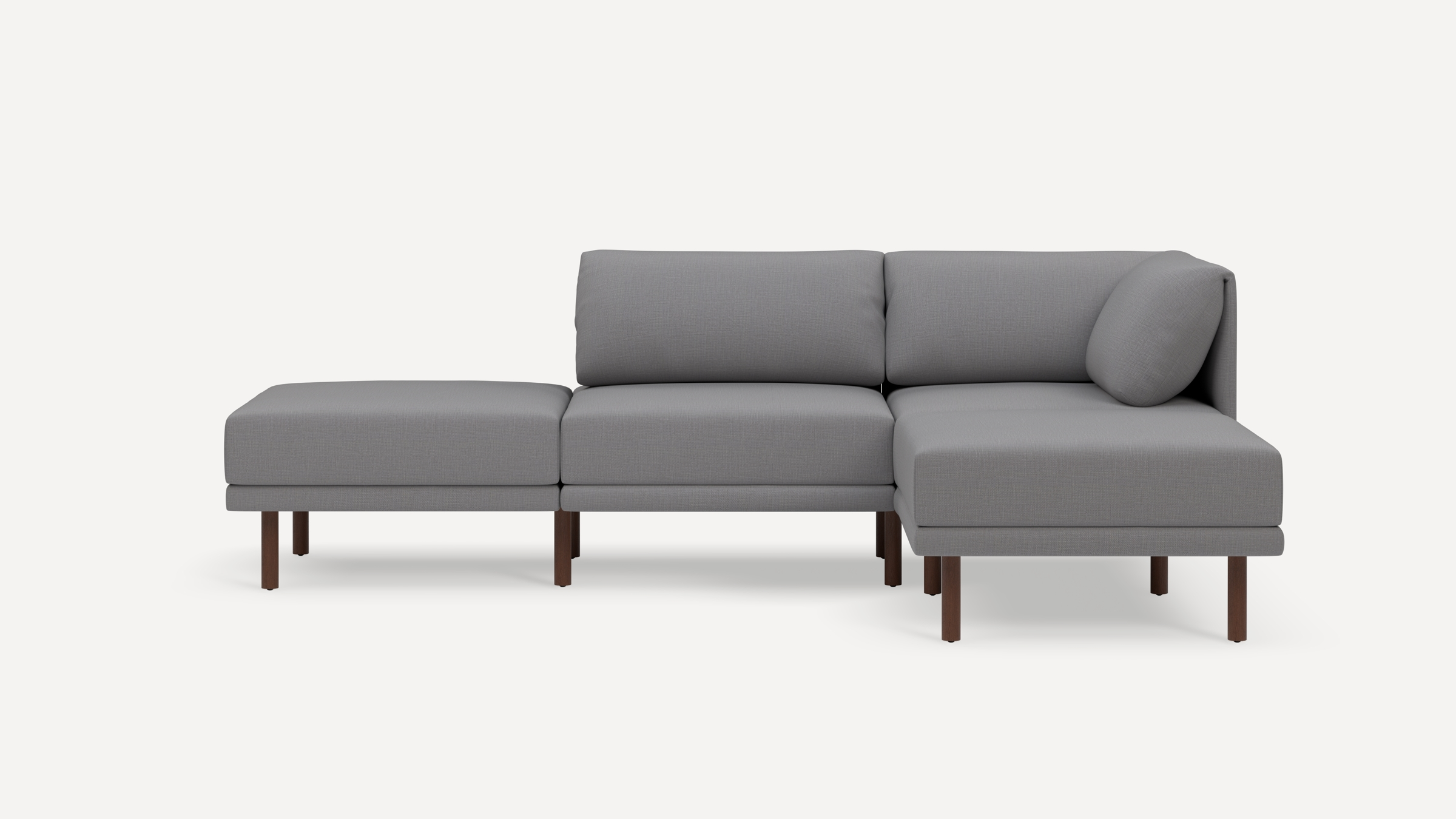 Modern grey sectional sofa with wooden legs, featuring a right-side chaise lounge and plush cushions.