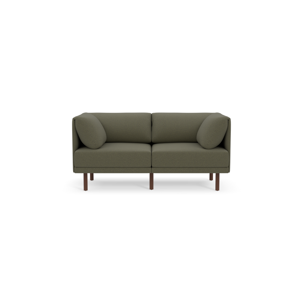 Modern two-seater sofa with textured Moss green fabric, rounded cushions, and slender wooden legs on a black background.