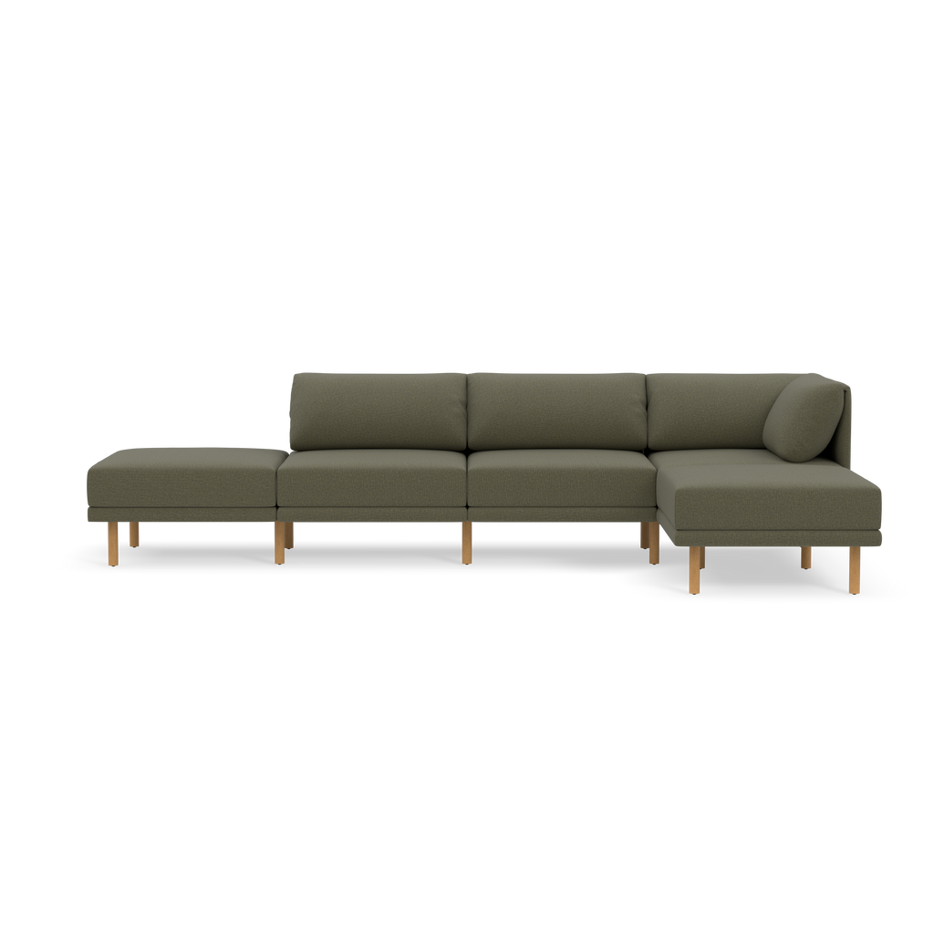 Modern Moss green sectional sofa with wooden legs, consisting of three seats and an extended chaise lounge on the right side.