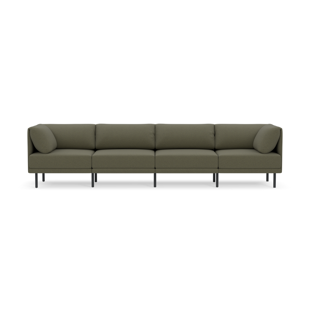 Modern Moss green sectional sofa with four seat cushions, two angled back pillows, and black metal legs on black background.