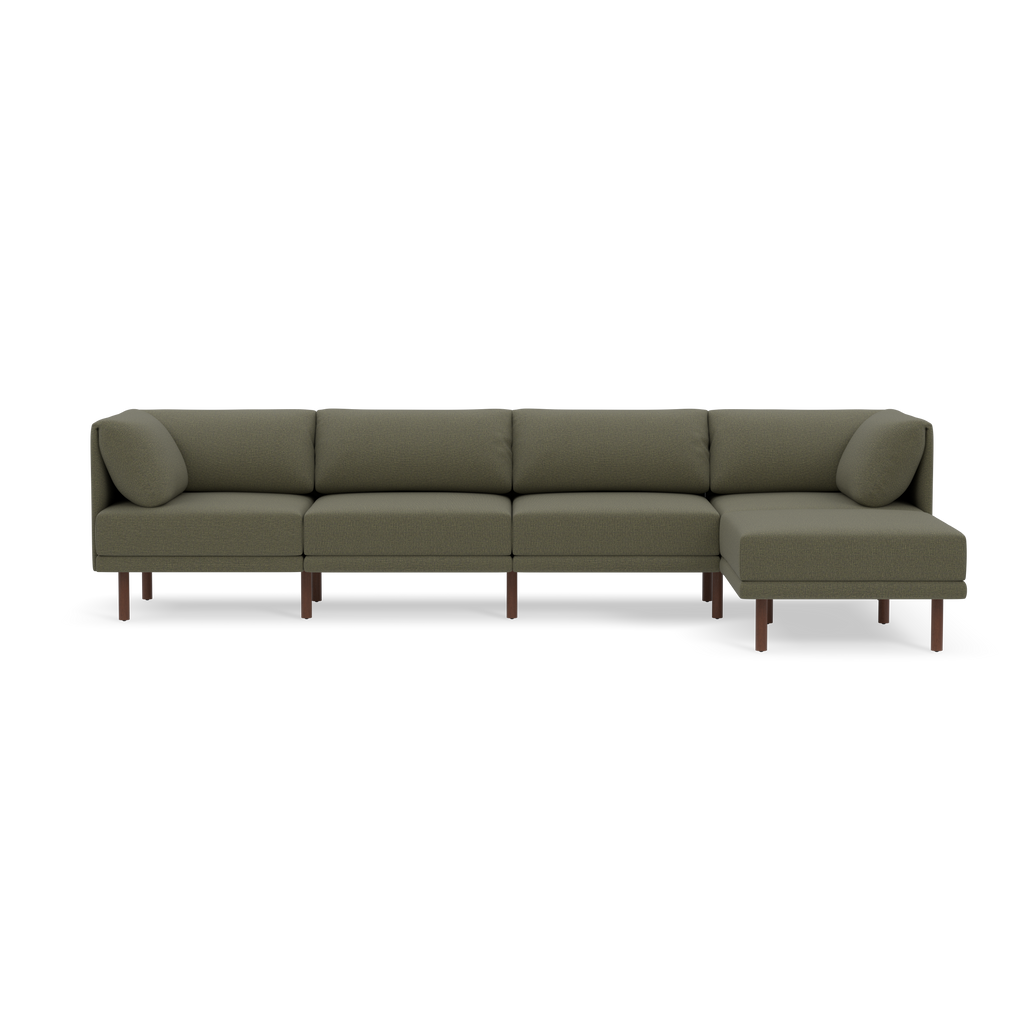 Modern L-shaped sectional sofa with Moss green fabric upholstery and wooden legs, featuring clean lines and plush cushions for comfort.