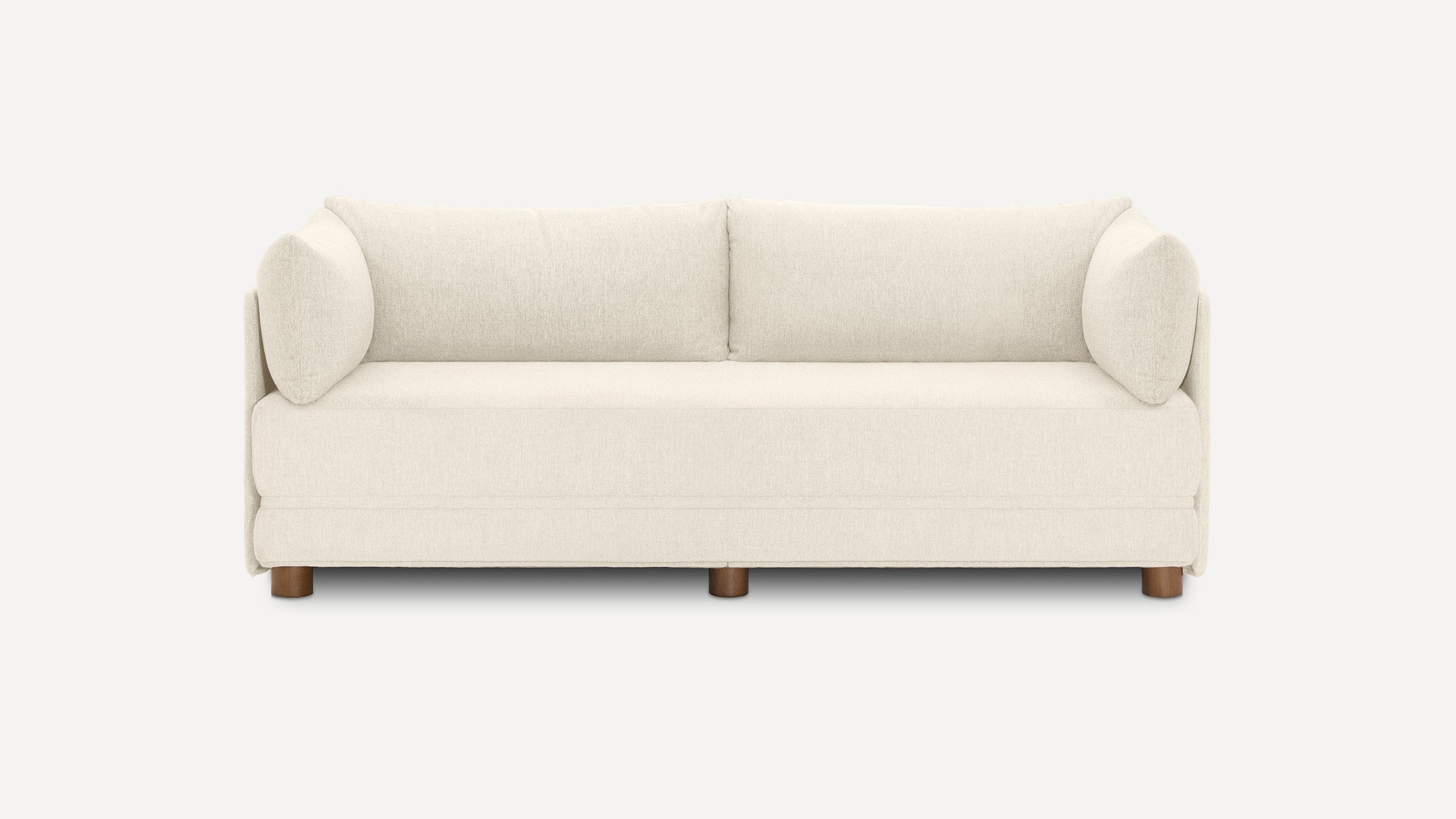 Modern three-seater sofa with light beige upholstery, rounded arms, two back cushions, and wooden legs against a plain white background.