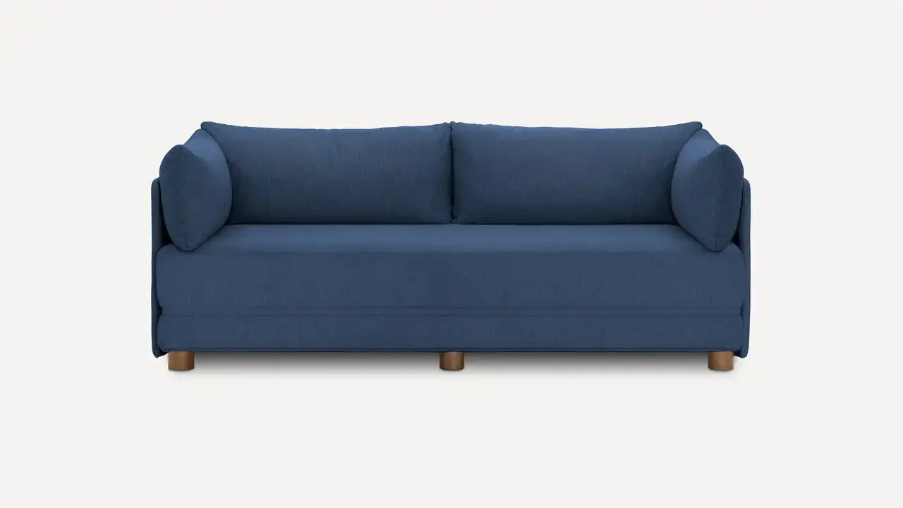 Three-seater modern navy blue fabric sofa with rounded arm cushions and wooden legs, shown against plain background.