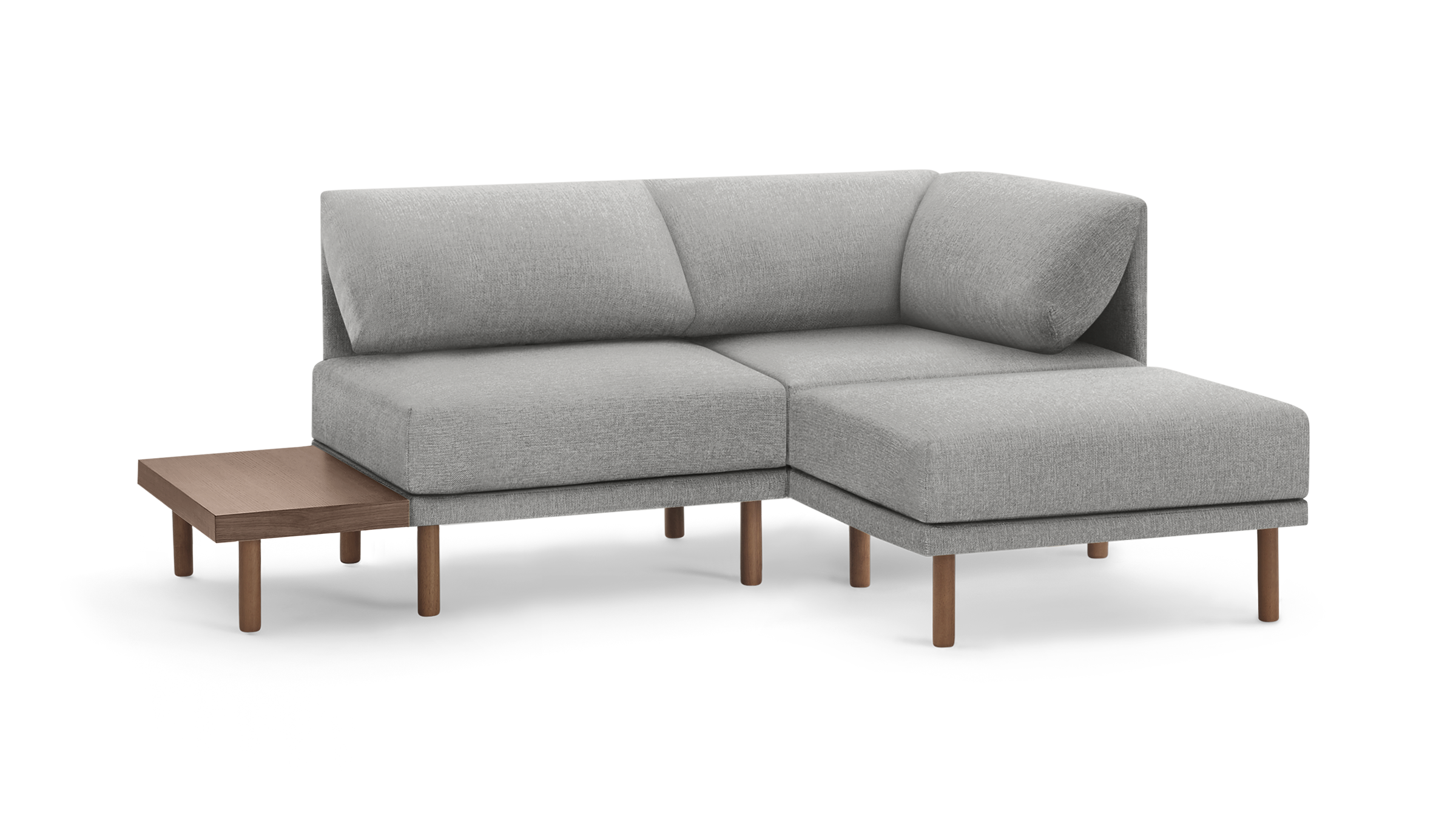 modern l - shaped sectional sofa with light gray fabric upholstery, wooden legs, and a matching ottoman, featuring a clean, minimal