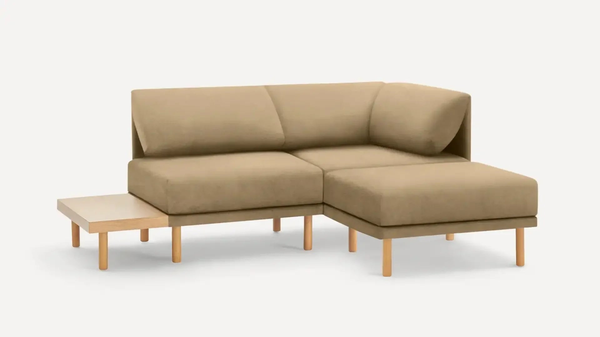 modern beige fabric sectional sofa with wooden legs and matching ottoman, featuring a clean, minimalist design