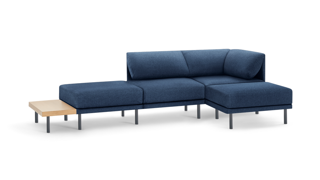 modern l - shaped sectional sofa with navy blue fabric upholstery, tapered wooden legs, and a matching ottoman, featuring a matching