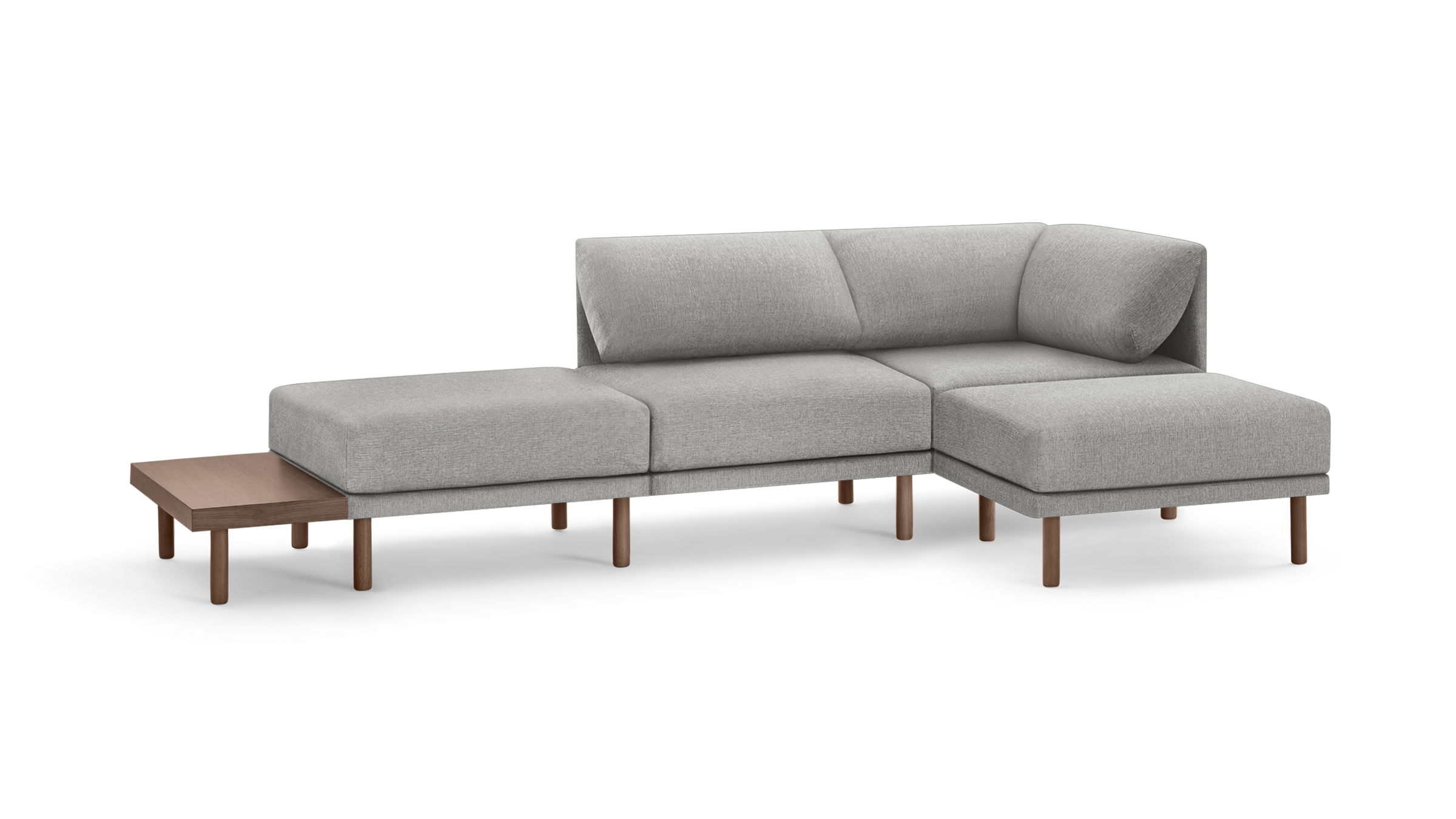 light gray fabric sectional sofa with wooden legs and matching ottoman, featuring a modern design and clean lines