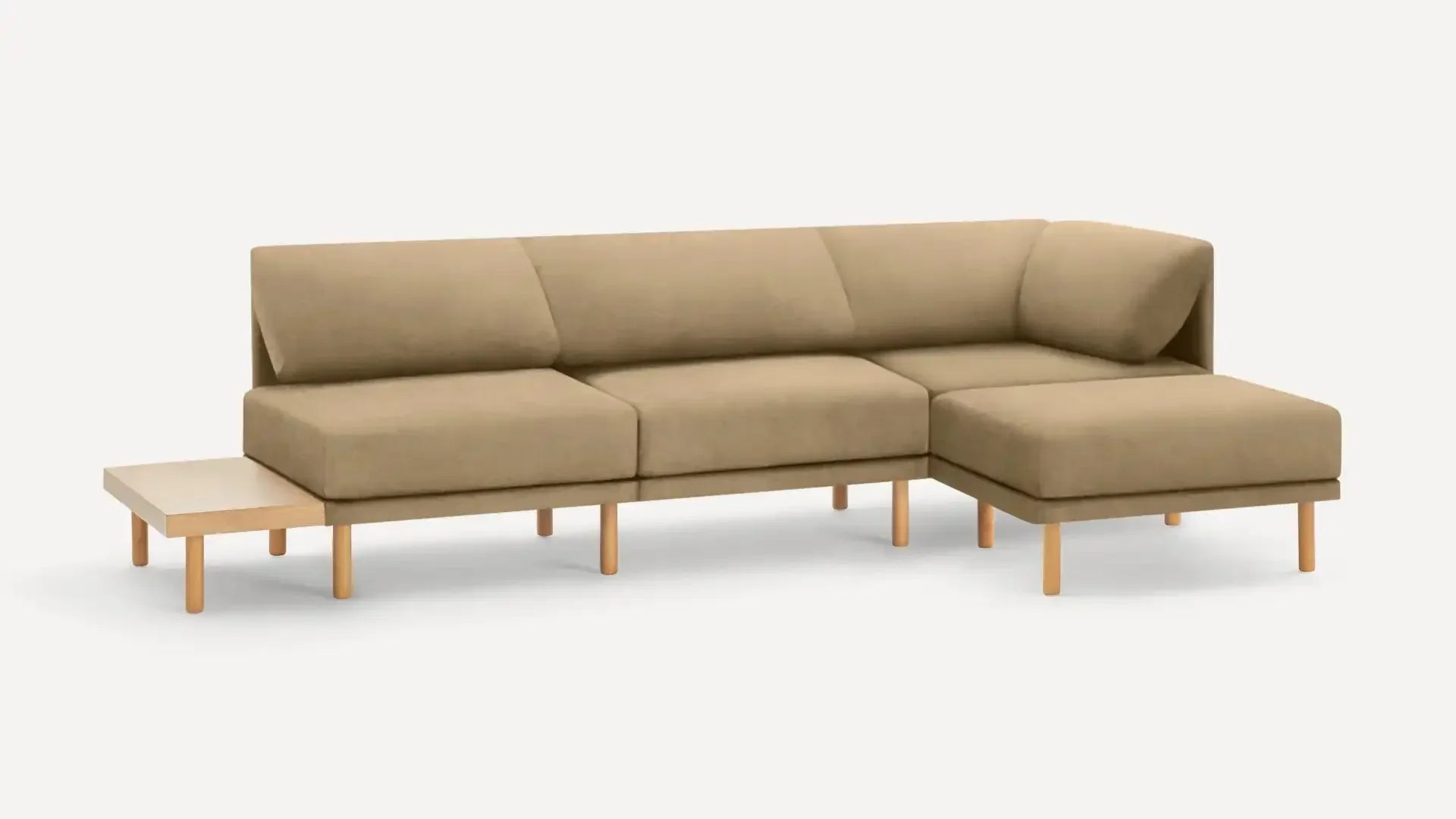 modern beige fabric sectional sofa with wooden legs and matching ottoman, minimalist design, clean lines, clean lines