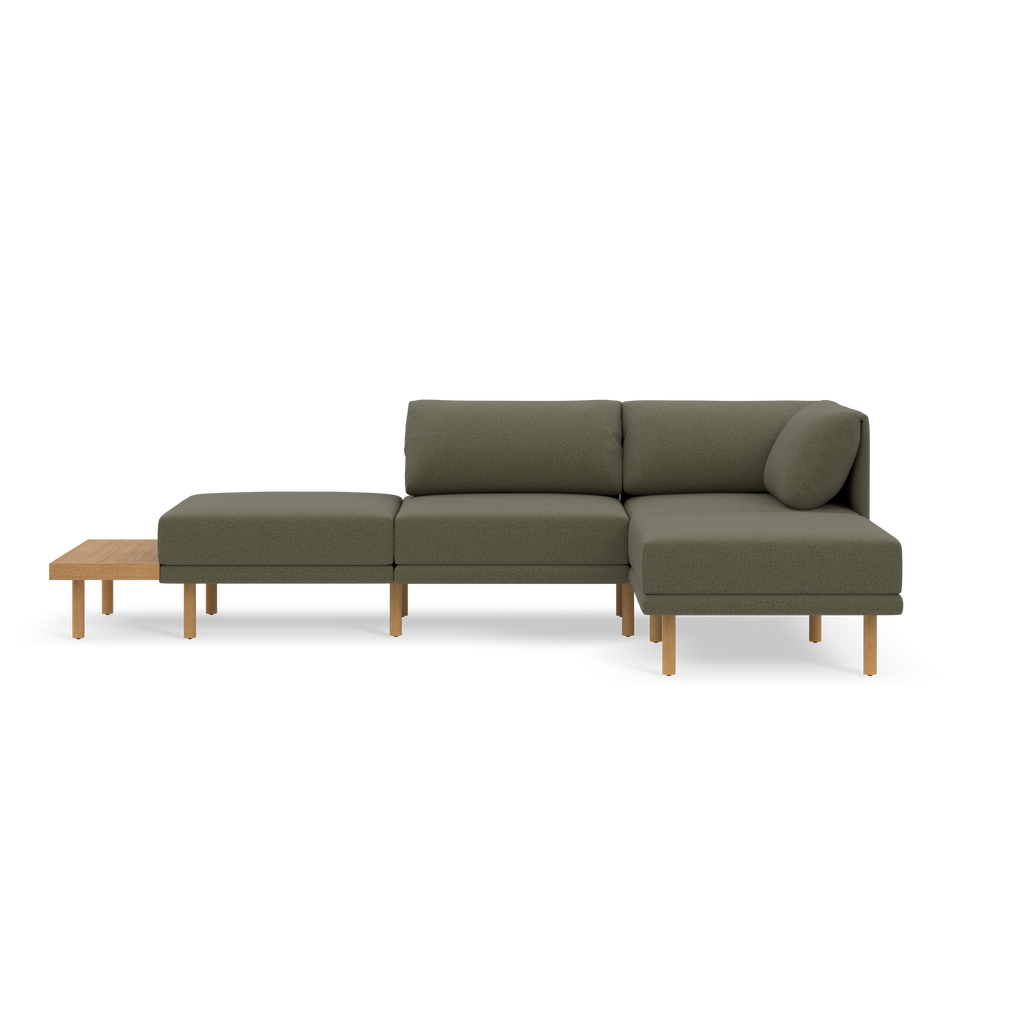 Modern Moss green sectional sofa with wooden legs and integrated light wood side table, featuring clean lines and plush cushions.