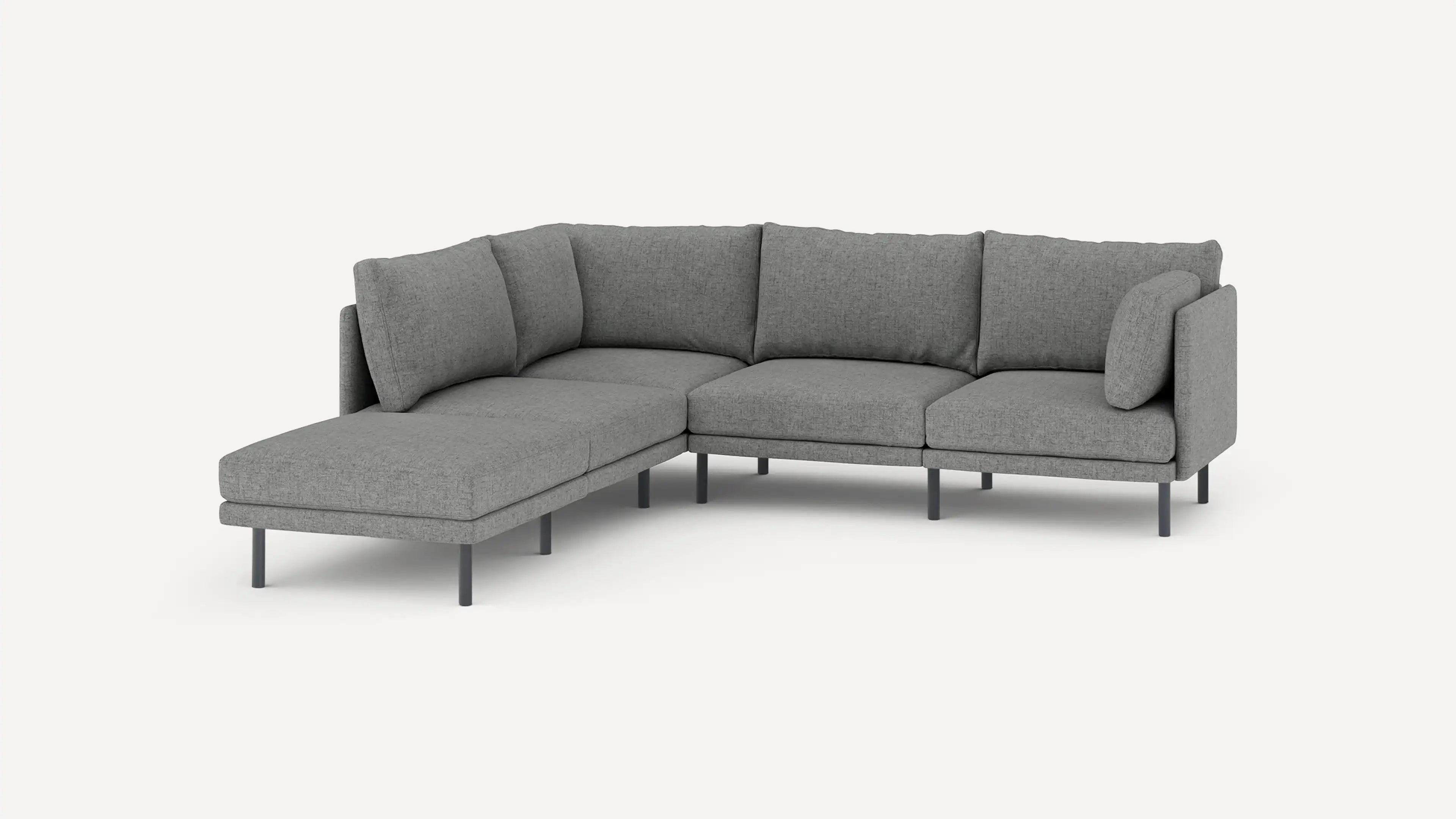 modern l - shaped sectional sofa with light gray fabric upholstery, black metal legs, and clean, minimalist design