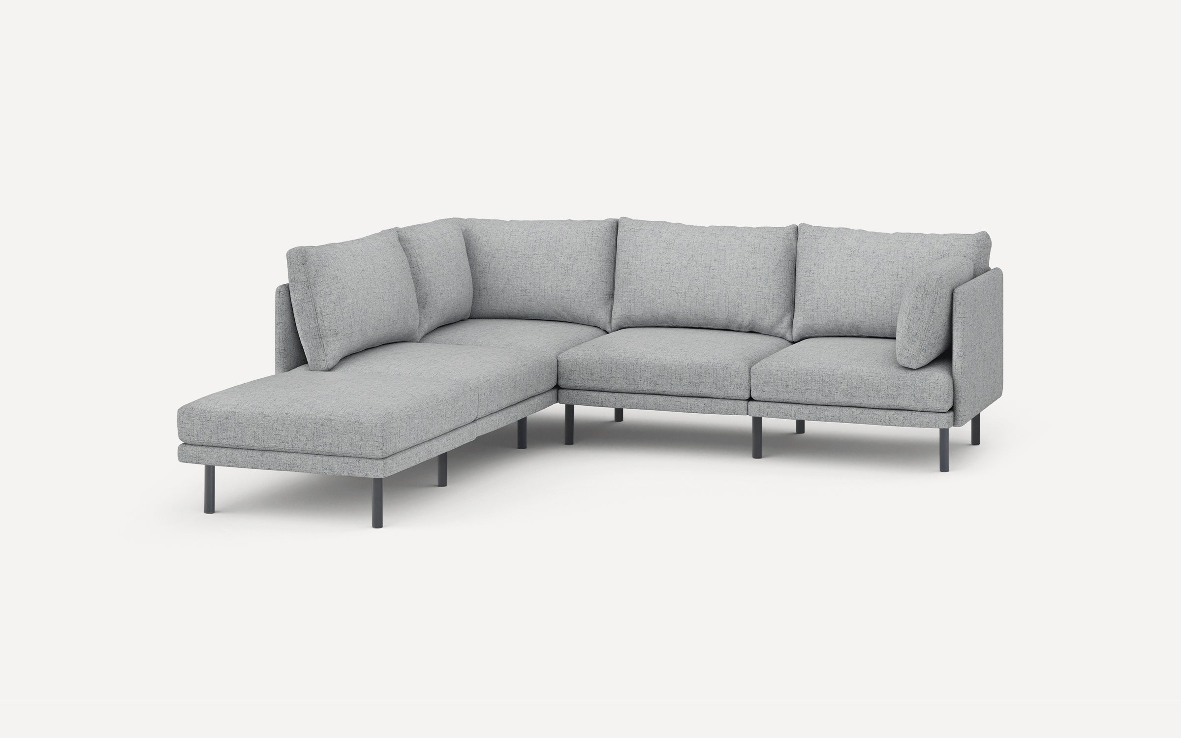 L-shaped modern sectional sofa with light gray fabric upholstery, slim black metal legs, and removable cushions on a white background.