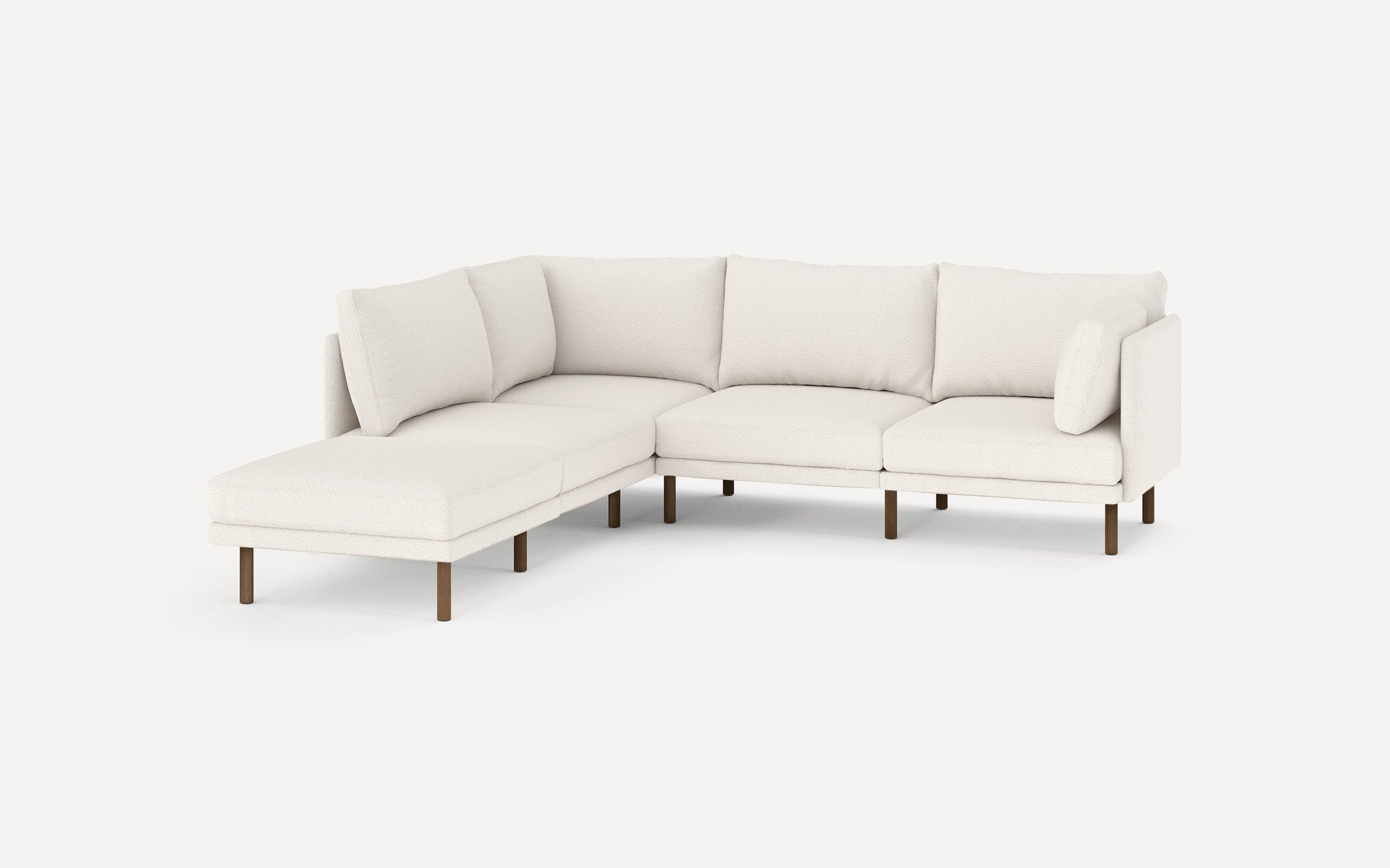 modern l - shaped sectional sofa with beige upholstery and wooden legs, featuring clean lines and clean lines, on a white background