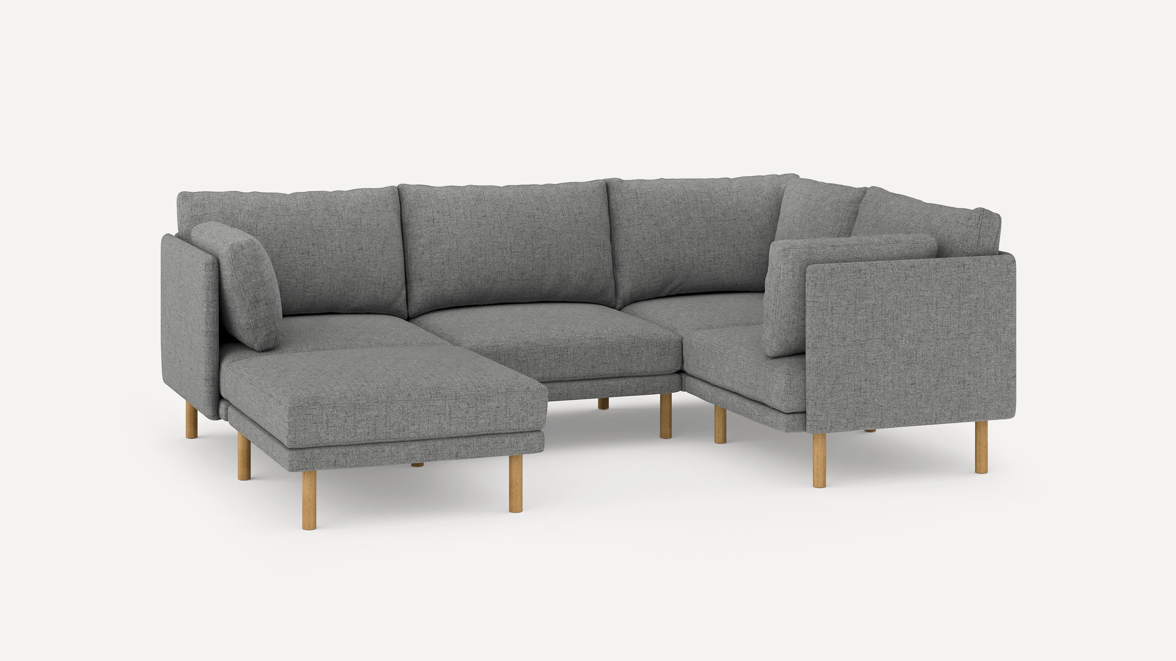 Modern gray fabric sectional sofa with wooden legs, featuring a chaise lounge and cushioned backrests for comfort.