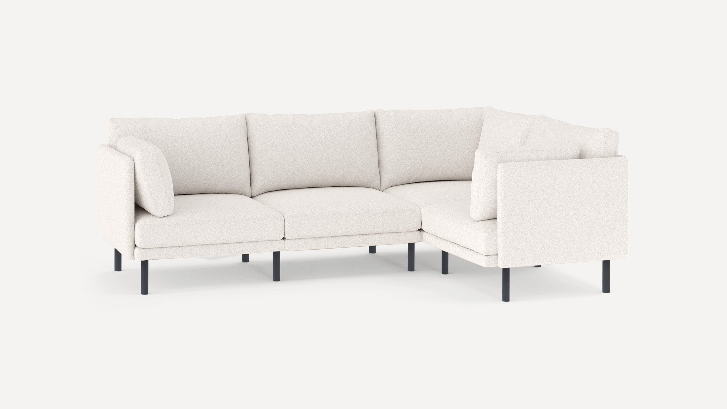 modern l - shaped sectional sofa with clean lines and soft cushions, featuring a deep - cushioned backrest, and black metal legs