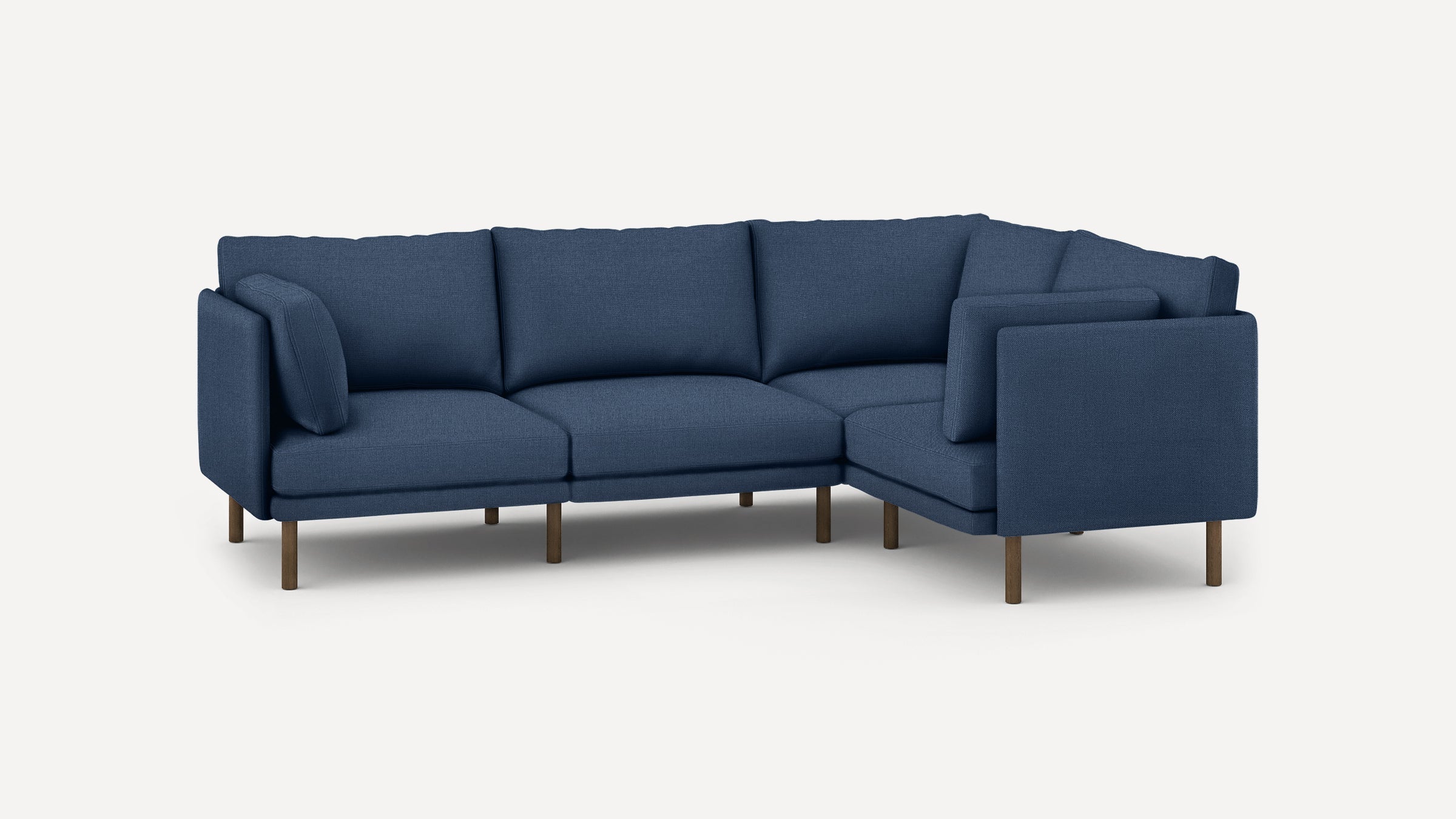 modern navy blue fabric sectional sofa with wooden legs and clean lines on the back, featuring a chaise lounge and clean lines on the front