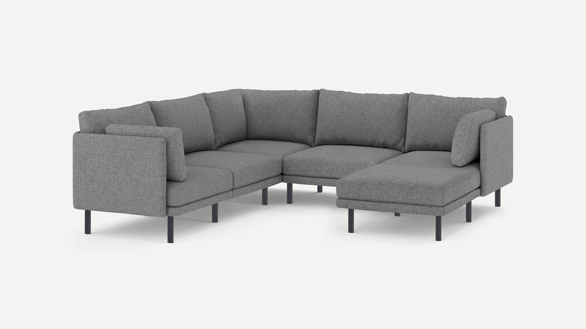 Gray fabric sectional sofa with metal legs, featuring a chaise on the right side and plush back cushions.