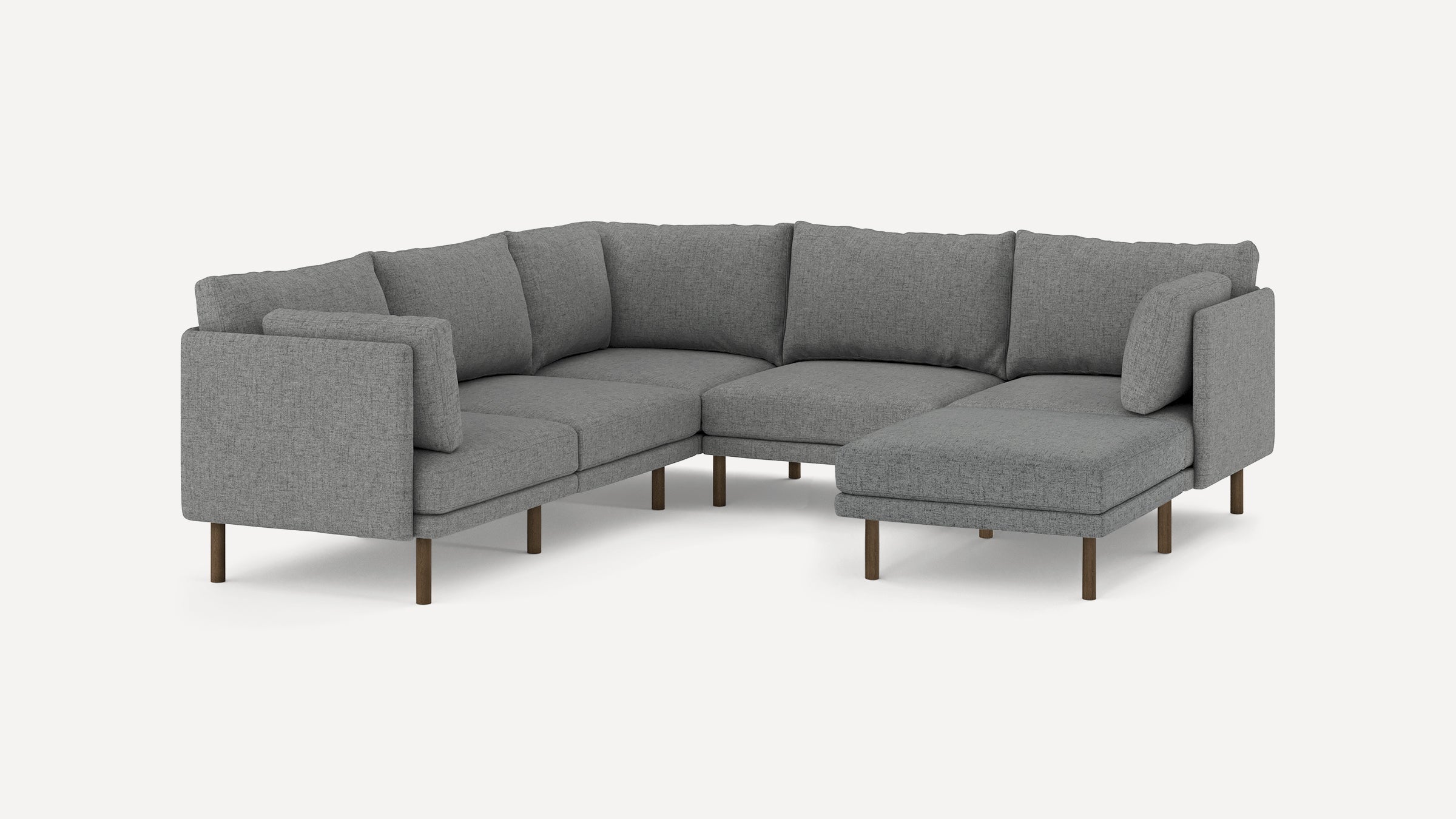 Modern gray fabric sectional sofa with wooden legs, L-shaped design, and plush back and seat cushions.