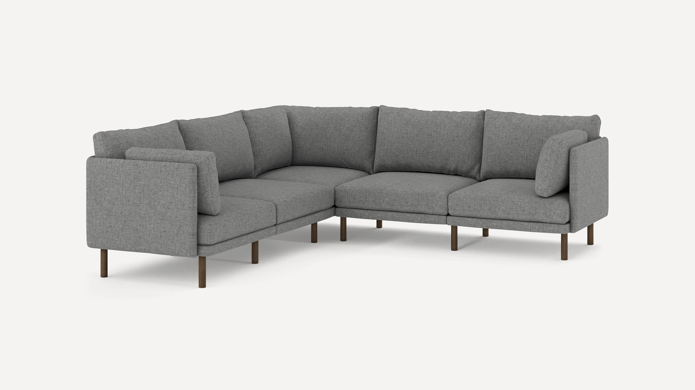 modern l - shaped sectional sofa with light gray fabric upholstery, wooden legs, and clean lines on a white background