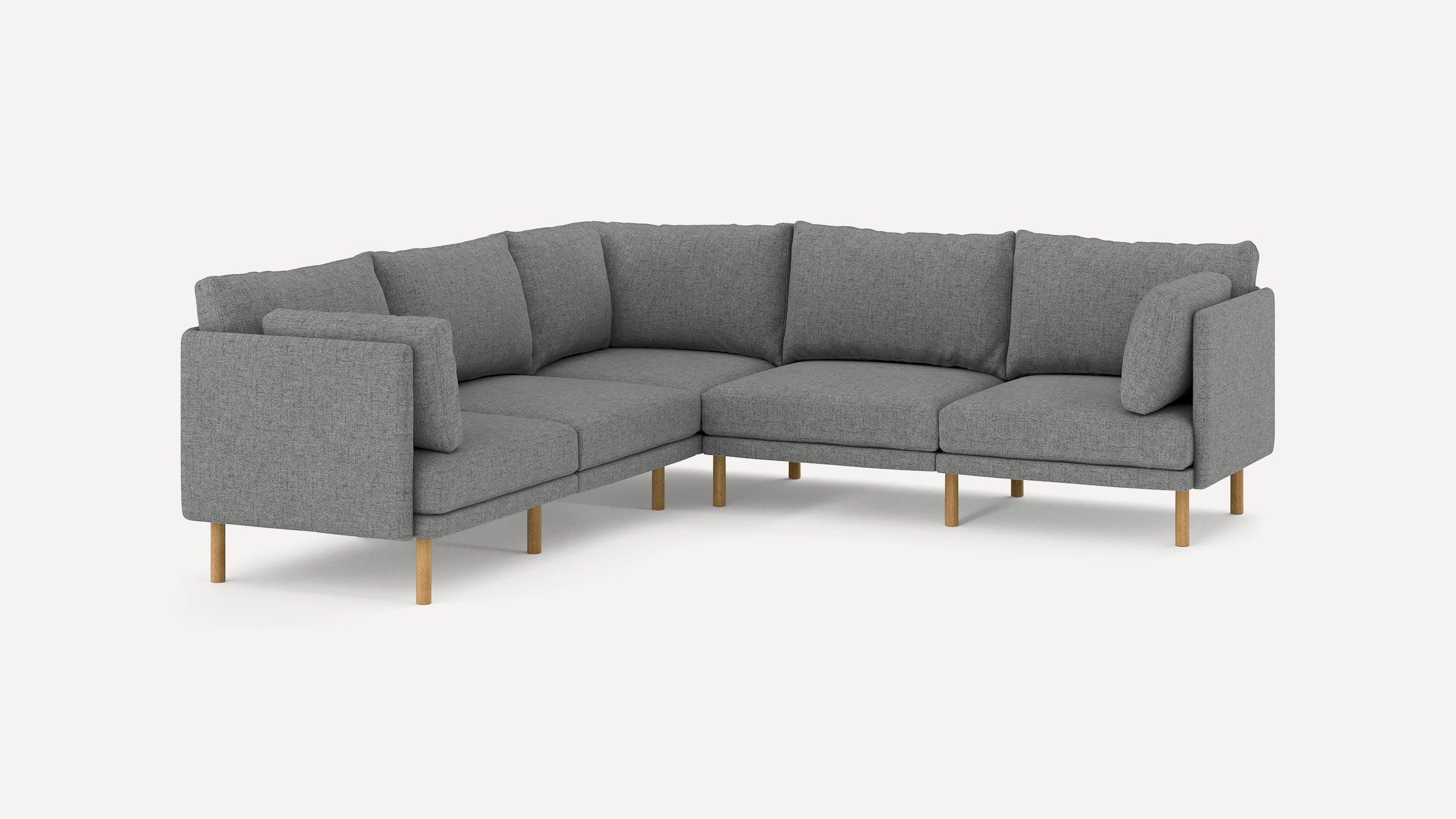modern l - shaped sectional sofa with light gray fabric upholstery, gold metal legs, and clean lines on a white background