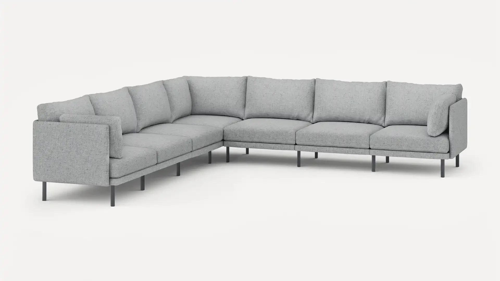 modern l - shaped sectional sofa with light gray fabric upholstery, black metal legs, and clean lines on a white background