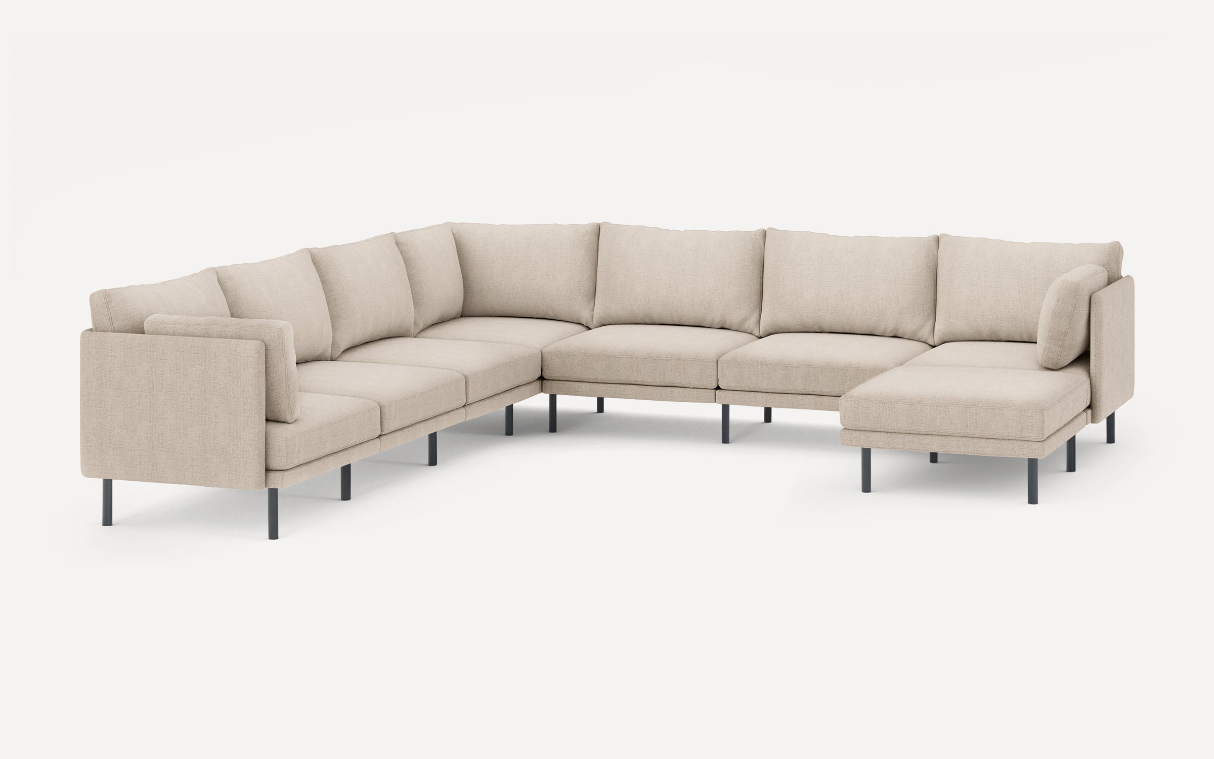 Beige L-shaped sectional sofa with clean lines, metal legs, and removable cushions for modern living room comfort.