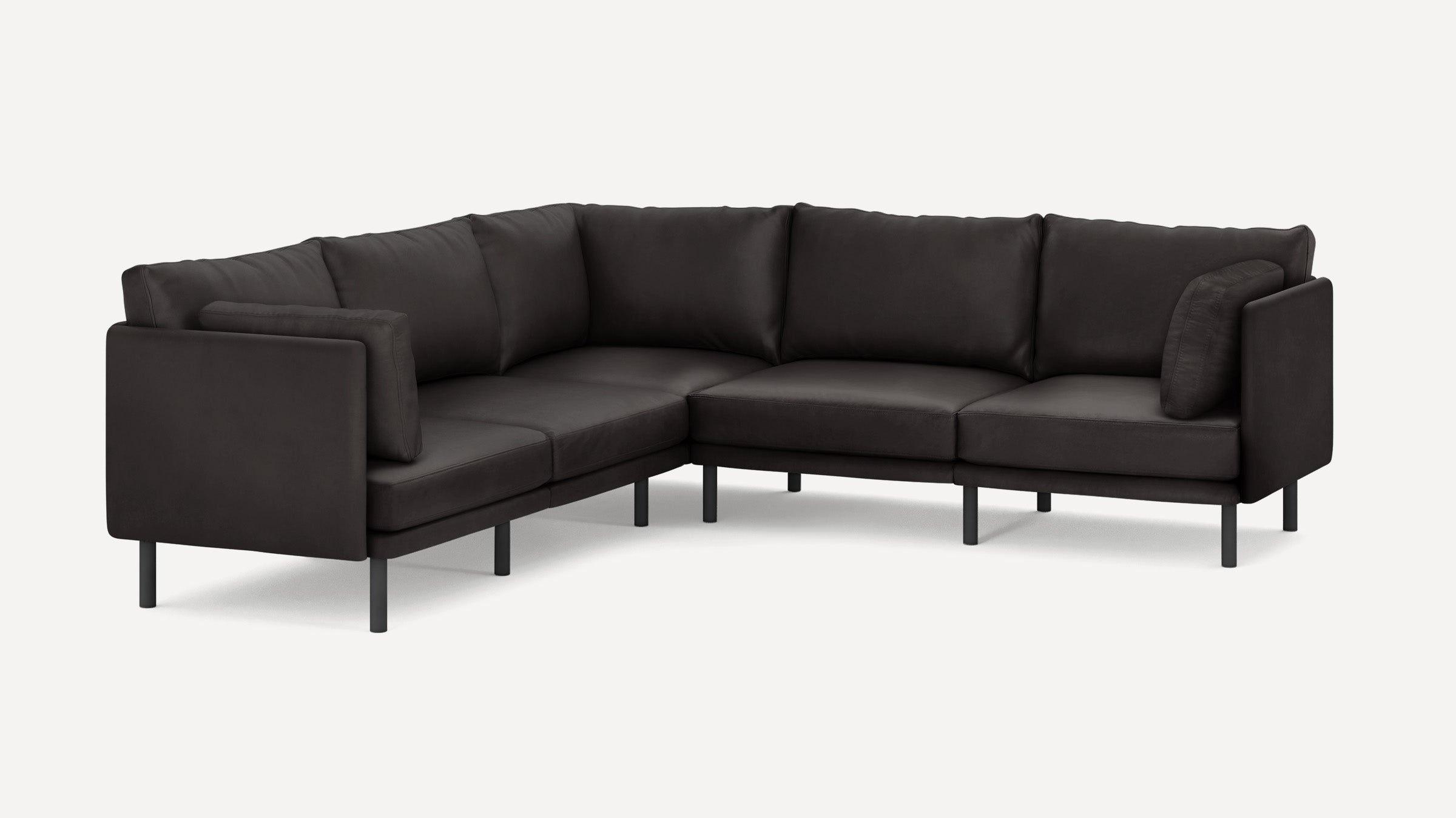 Dark gray modern sectional sofa with clean lines, thin legs, and plush cushions arranged in an L-shape.