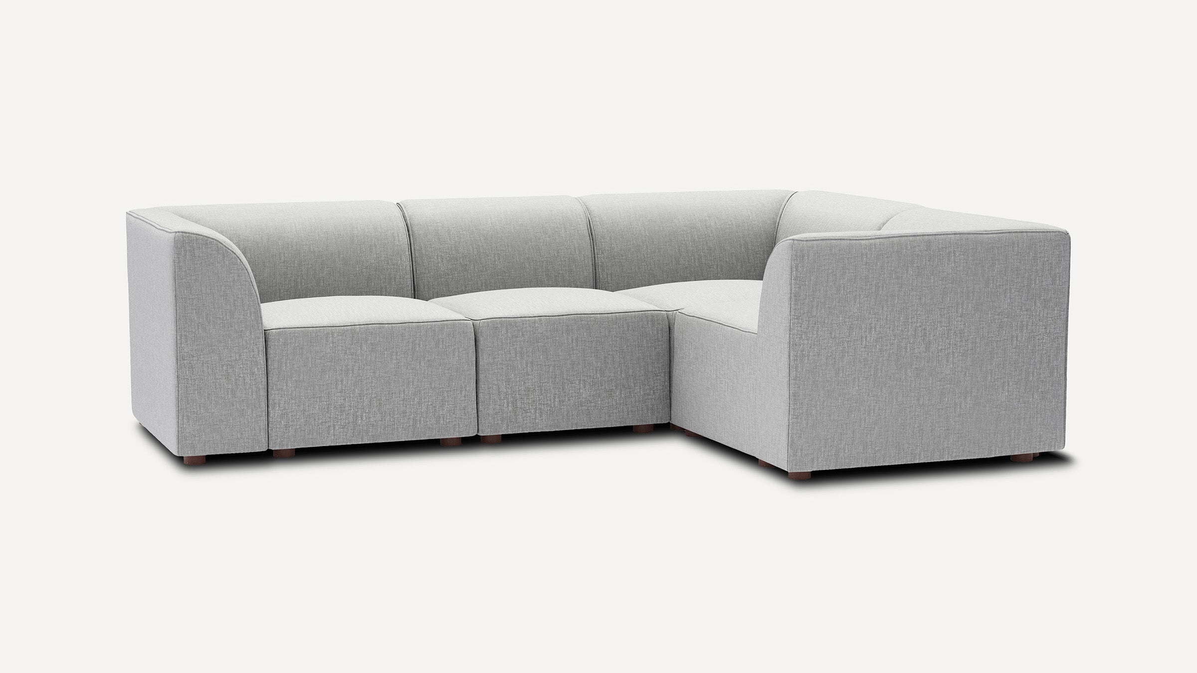 modern light gray fabric l - shaped sectional sofa with wooden legs and clean lines on the back, featuring a deep cushioned seat and backrest