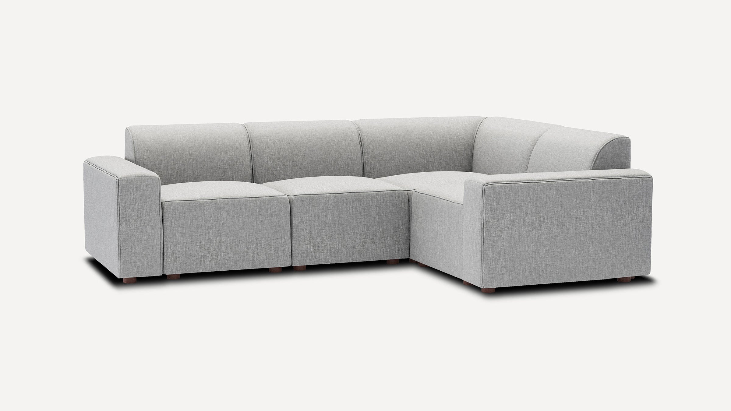 modern light gray fabric l - shaped sectional sofa with wooden legs and clean lines on the back, featuring a deep - seat, back - cushion