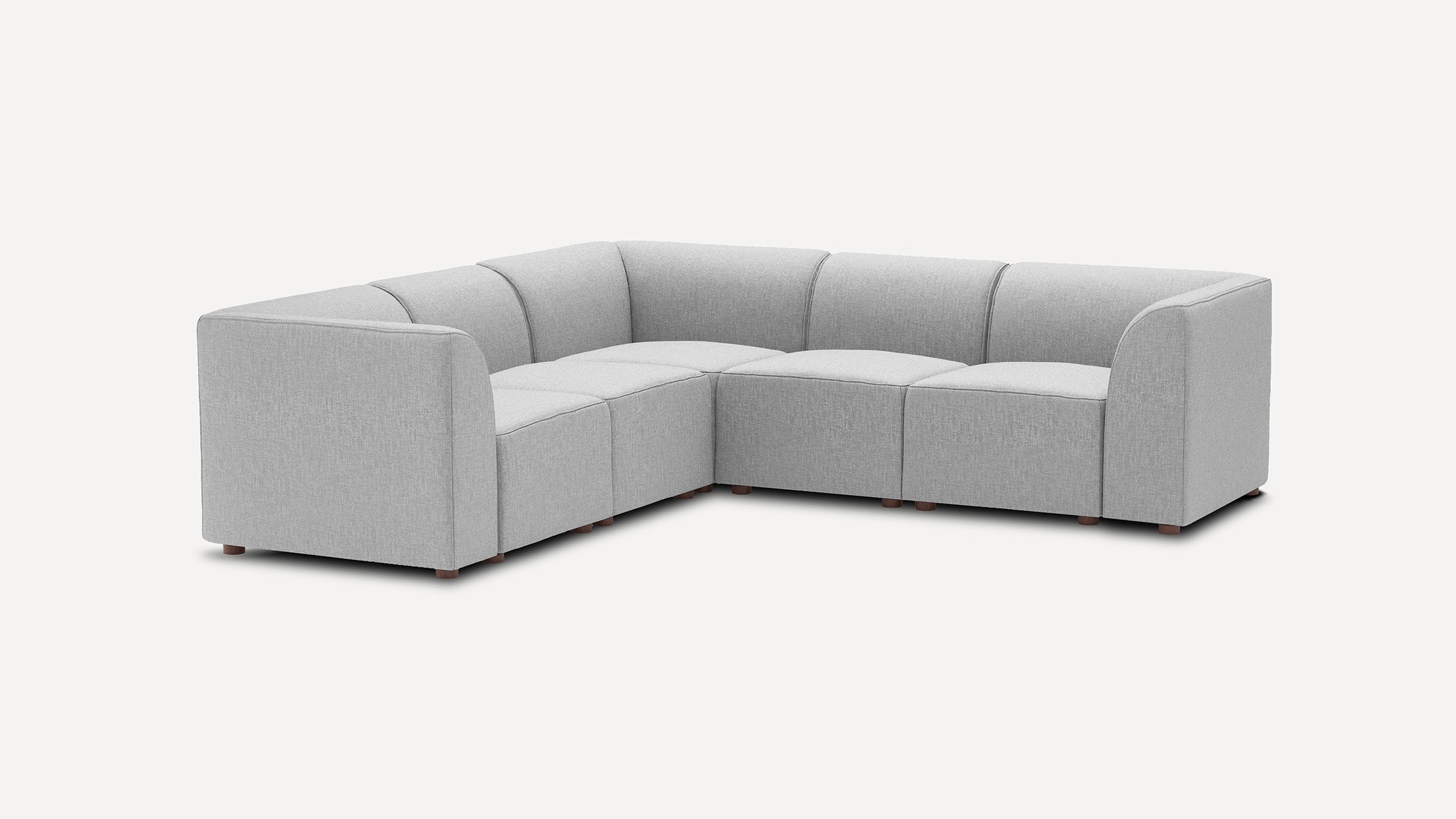 modern light gray fabric l - shaped sectional sofa with wooden legs and clean lines on the back, featuring a center cushion and matching ottoman