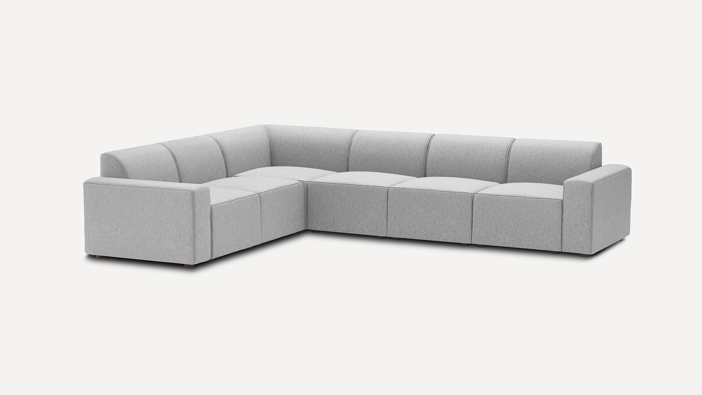 modern light gray fabric l - shaped sectional sofa with six seats and back cushions, featuring a tapered backrest, and a red tapered