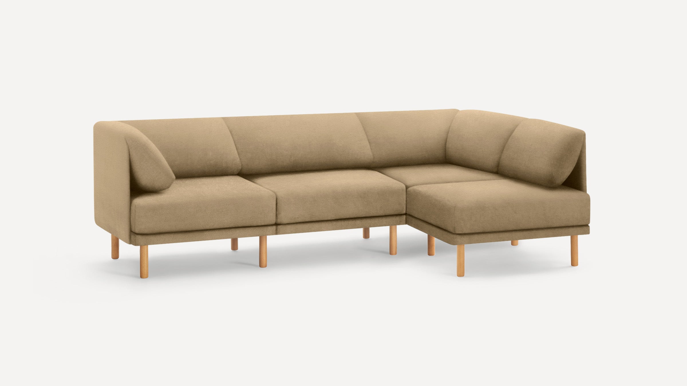 Beige upholstered L-shaped sectional sofa with wooden legs, featuring a modern minimalist design and plush cushions.