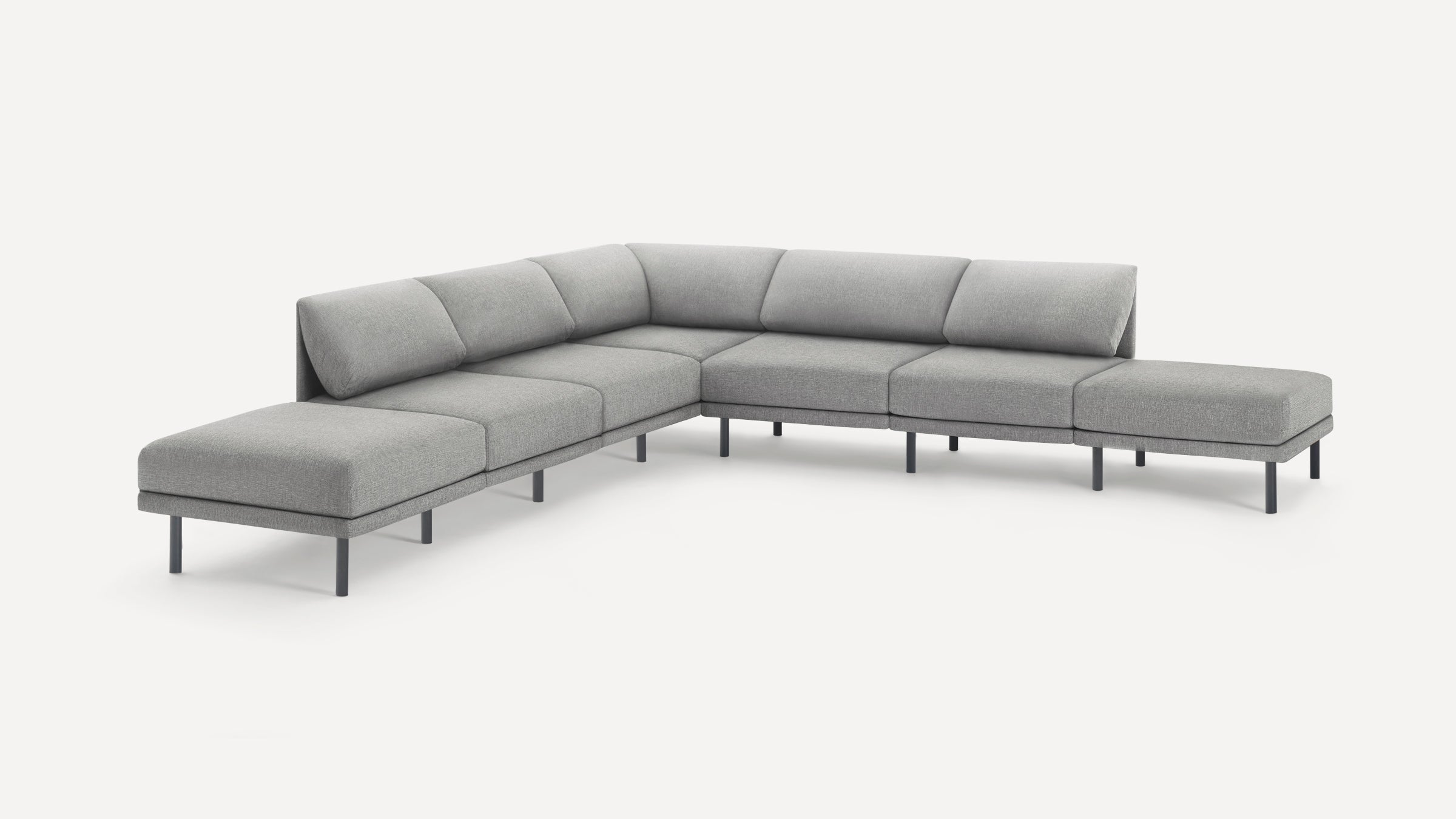 Modern light grey fabric sectional sofa with metal legs, featuring a minimalist design and plush cushions for comfort.