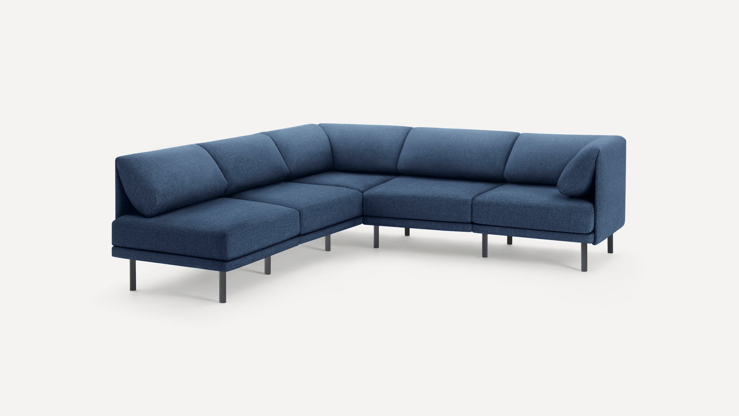 Modern L-shaped sectional sofa with blue fabric upholstery and slender black metal legs, minimalist design on white background.