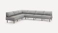 Large modern gray sectional sofa with fabric upholstery and wooden legs, featuring a low back and plush cushions.