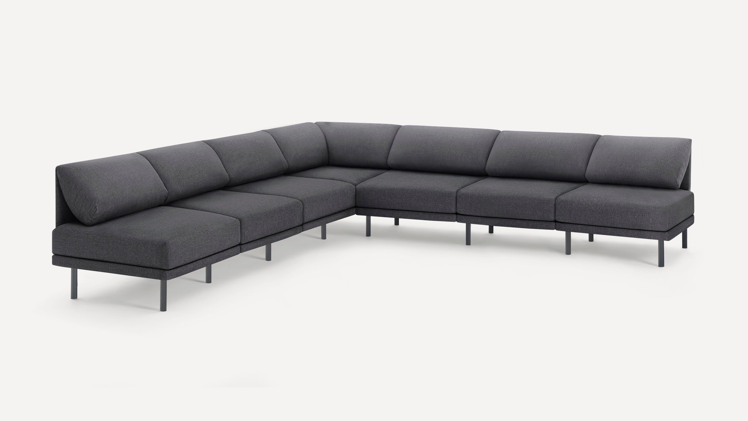 Dark gray modern L-shaped sectional sofa with cushioned seats and backrests, supported by slim metal legs.