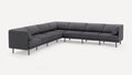 Modern dark gray fabric sectional sofa with clean lines, metal legs, and plush cushions arranged in an L-shape.