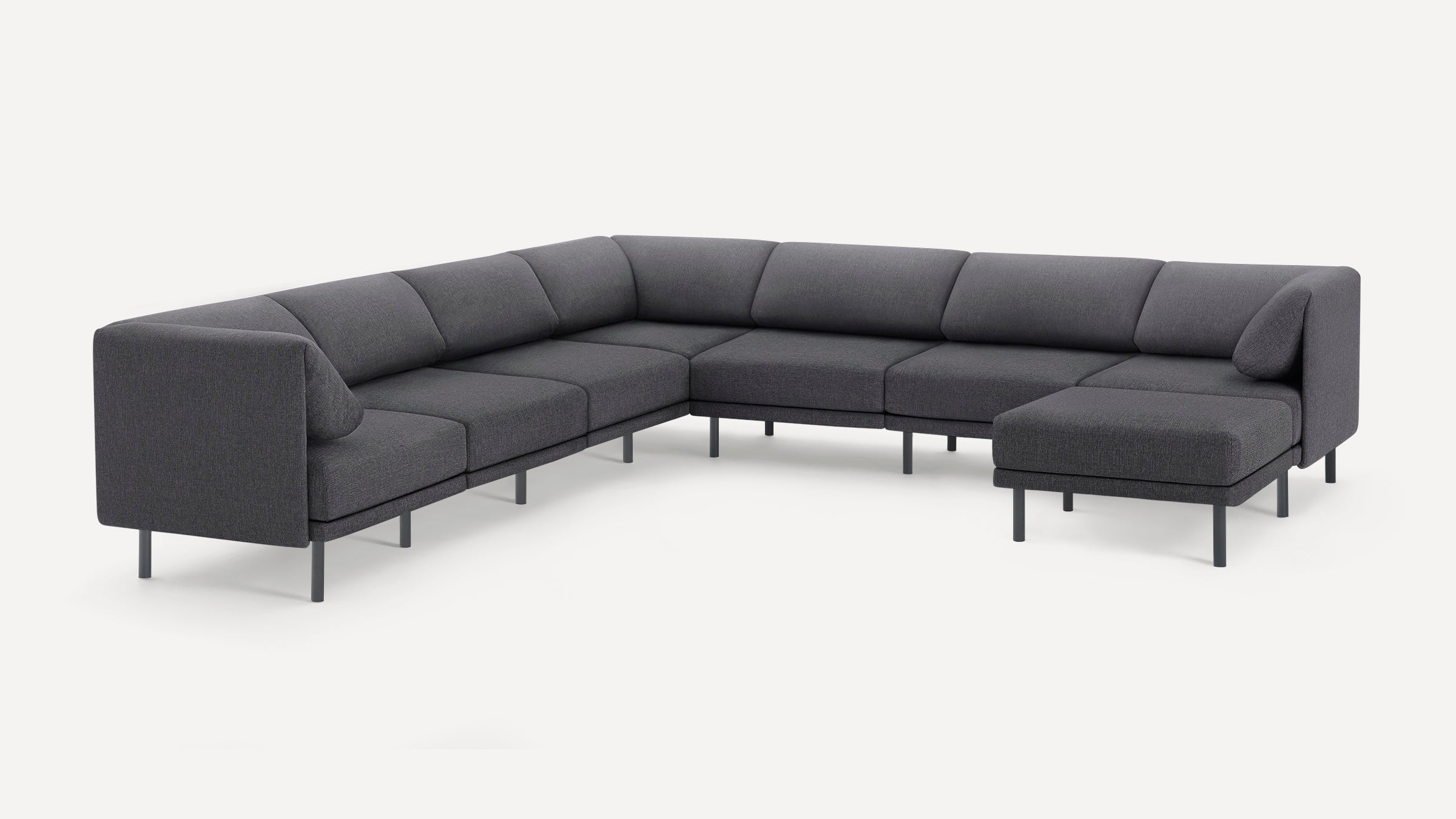 Modern dark gray fabric sectional sofa with clean lines, metal legs, and an L-shaped configuration for spacious seating.