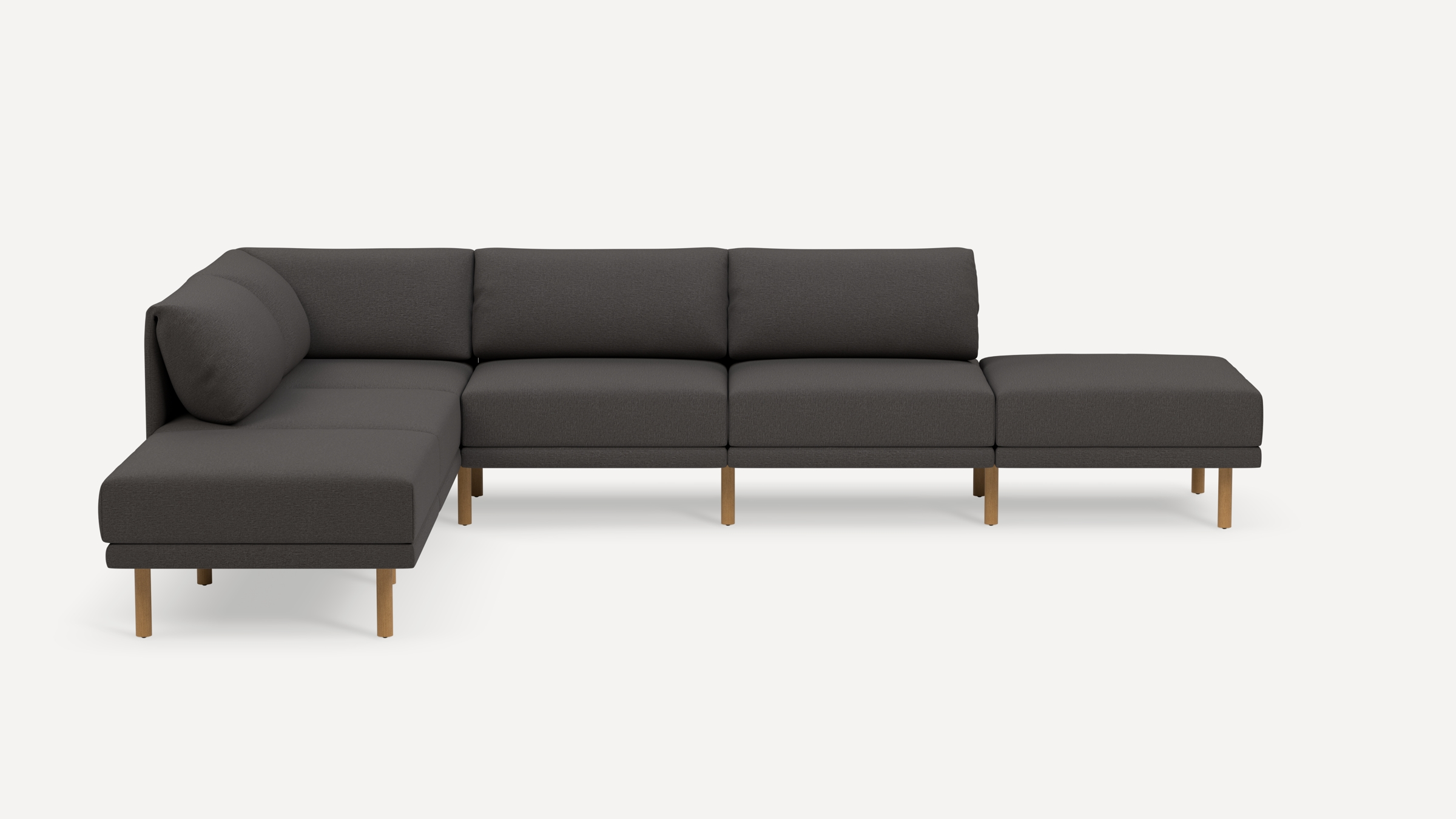 Modern dark gray fabric sectional sofa with wooden legs, featuring a left corner chaise and a right ottoman extension.