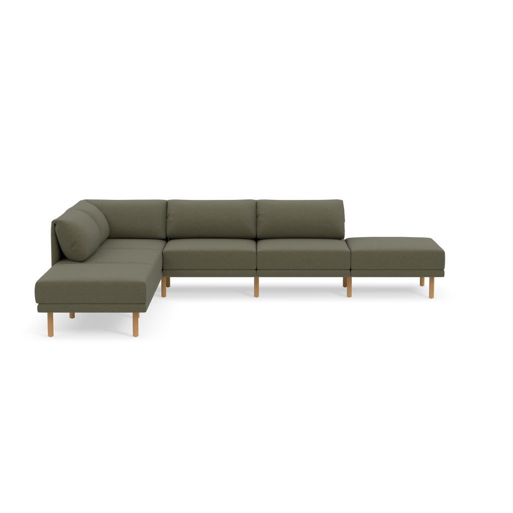 Modern L-shaped sectional sofa with Moss green fabric upholstery and wooden legs, featuring a chaise lounge and ottoman unit.
