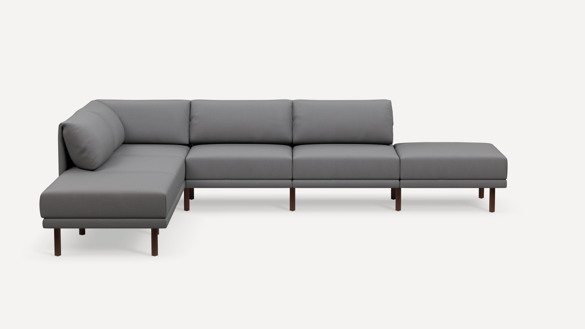 Modern L-shaped sectional sofa in gray fabric with wooden legs, featuring clean lines and cushioned backrests and seats.