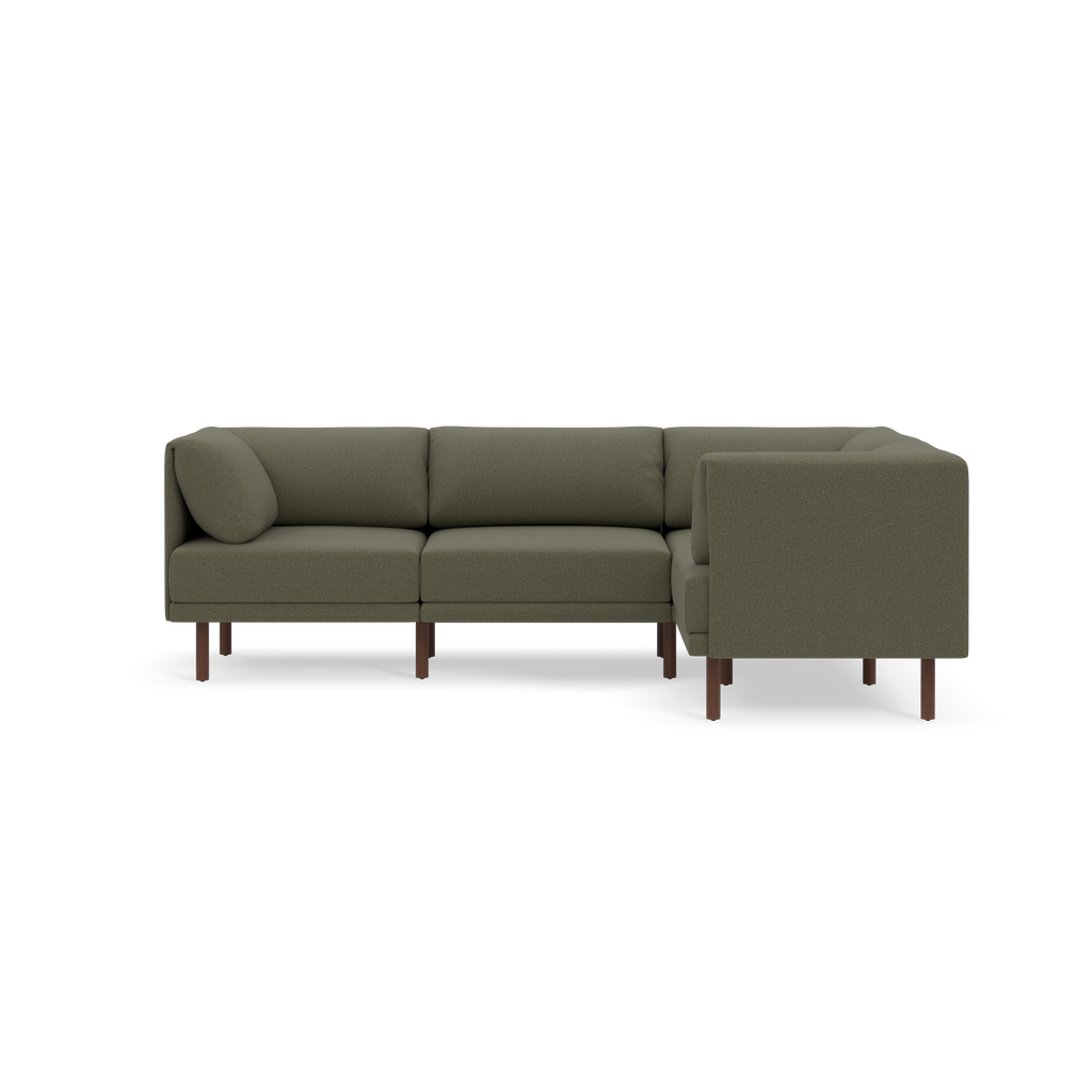 Modern L-shaped sectional sofa with Moss green fabric upholstery and wooden legs, featuring plush back and seat cushions.
