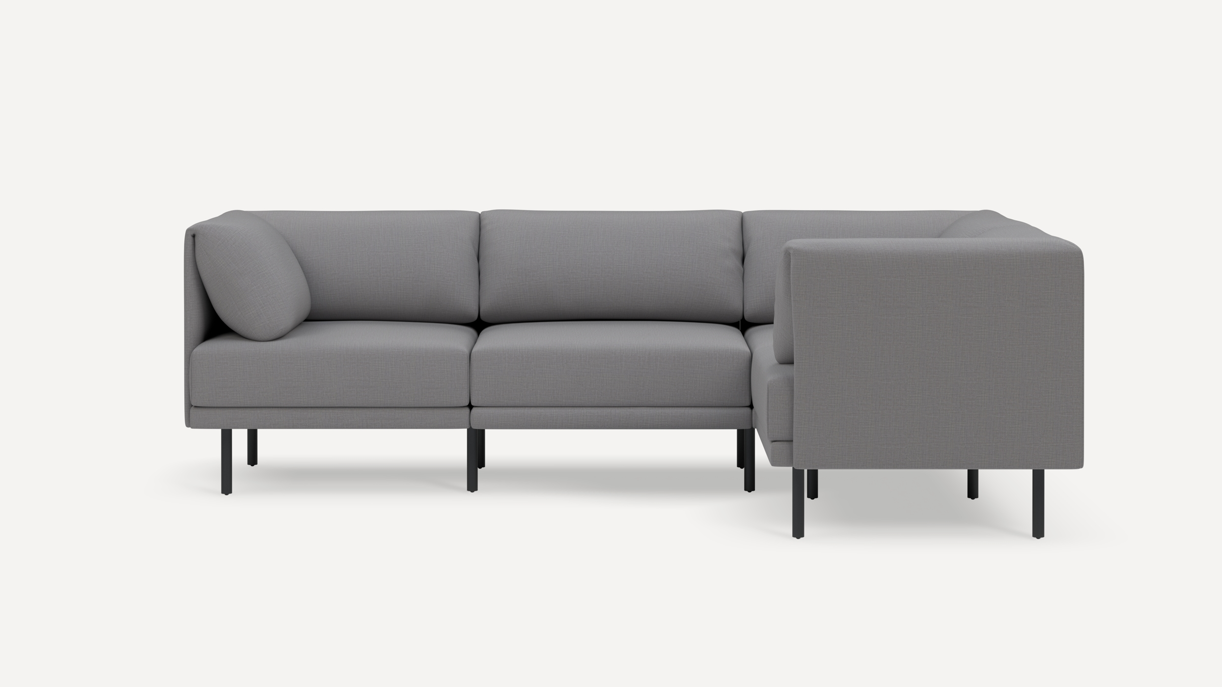 Modern gray L-shaped sectional sofa with cushioned seats, straight armrests, and black metal legs on white background.