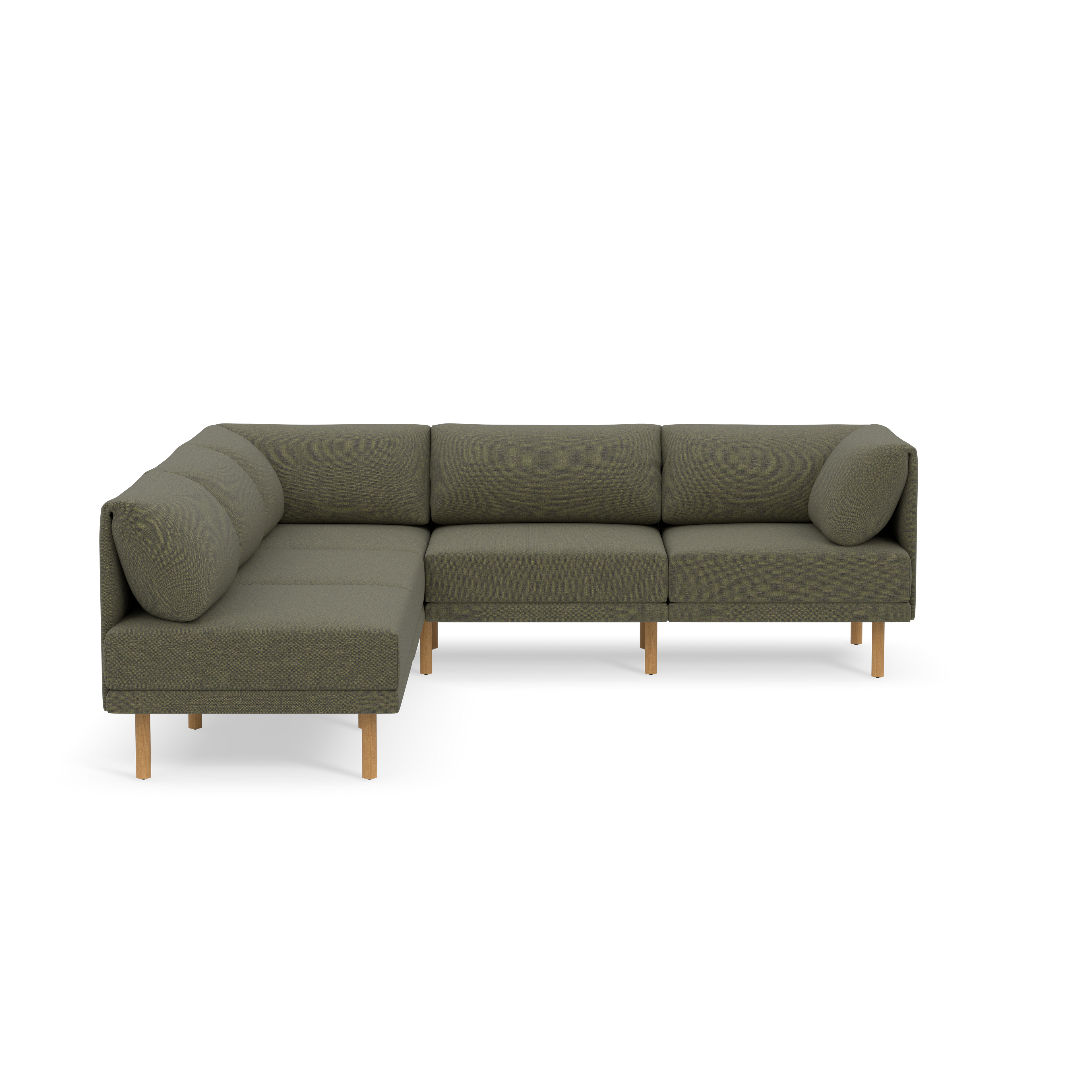 Modern L-shaped sectional sofa upholstered in Moss green fabric with wooden legs and plush back cushions, set against black background.