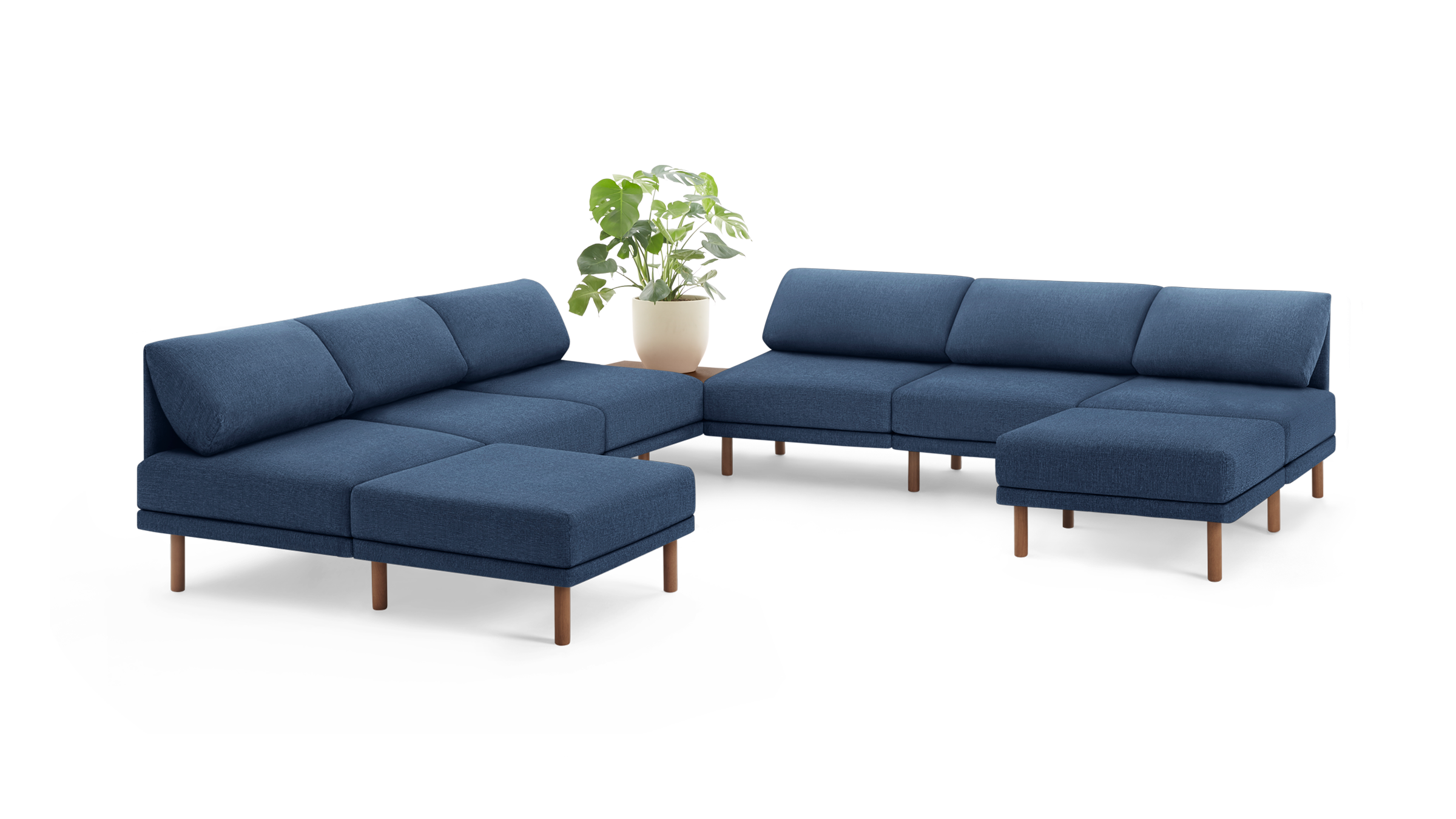 modern blue fabric sectional sofa with wooden legs and matching ottoman, featuring a clean, minimalist design