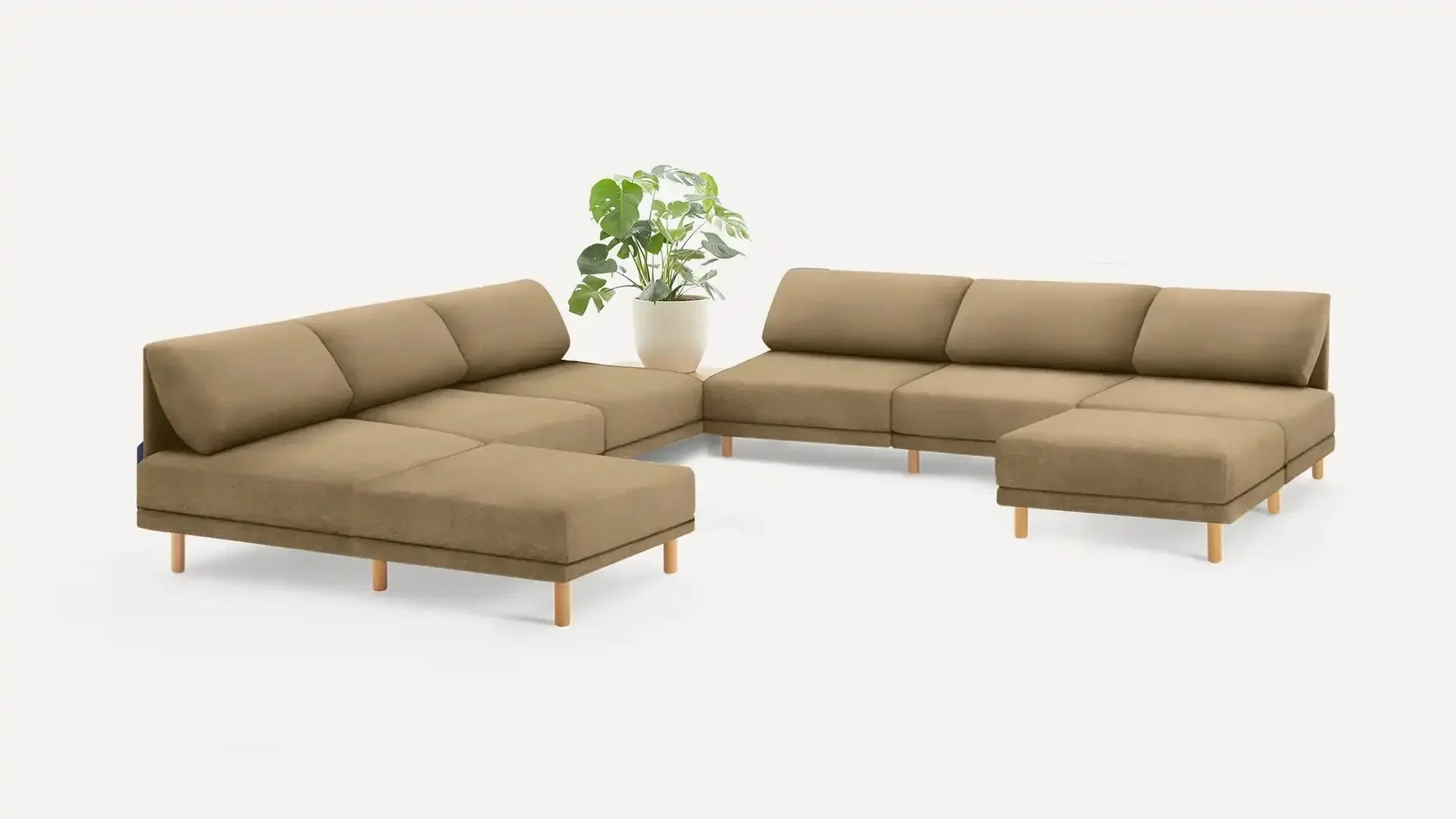 modern beige fabric sectional sofa with wooden legs and matching cushions, featuring a clean minimalist design