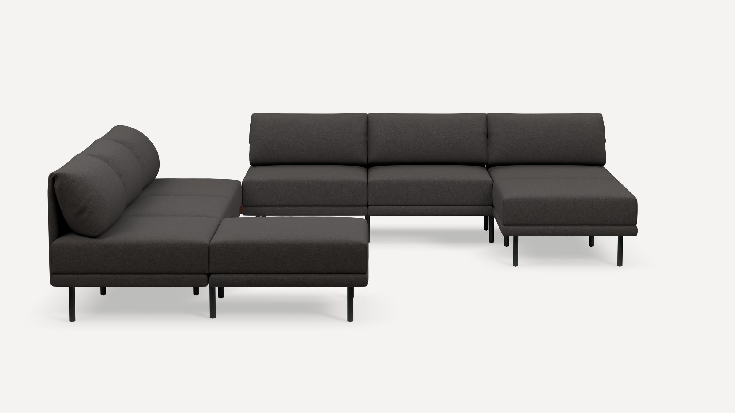 Dark gray modern sectional sofa with a raised metal leg frame and plush back cushions, arranged in an L-shape configuration.