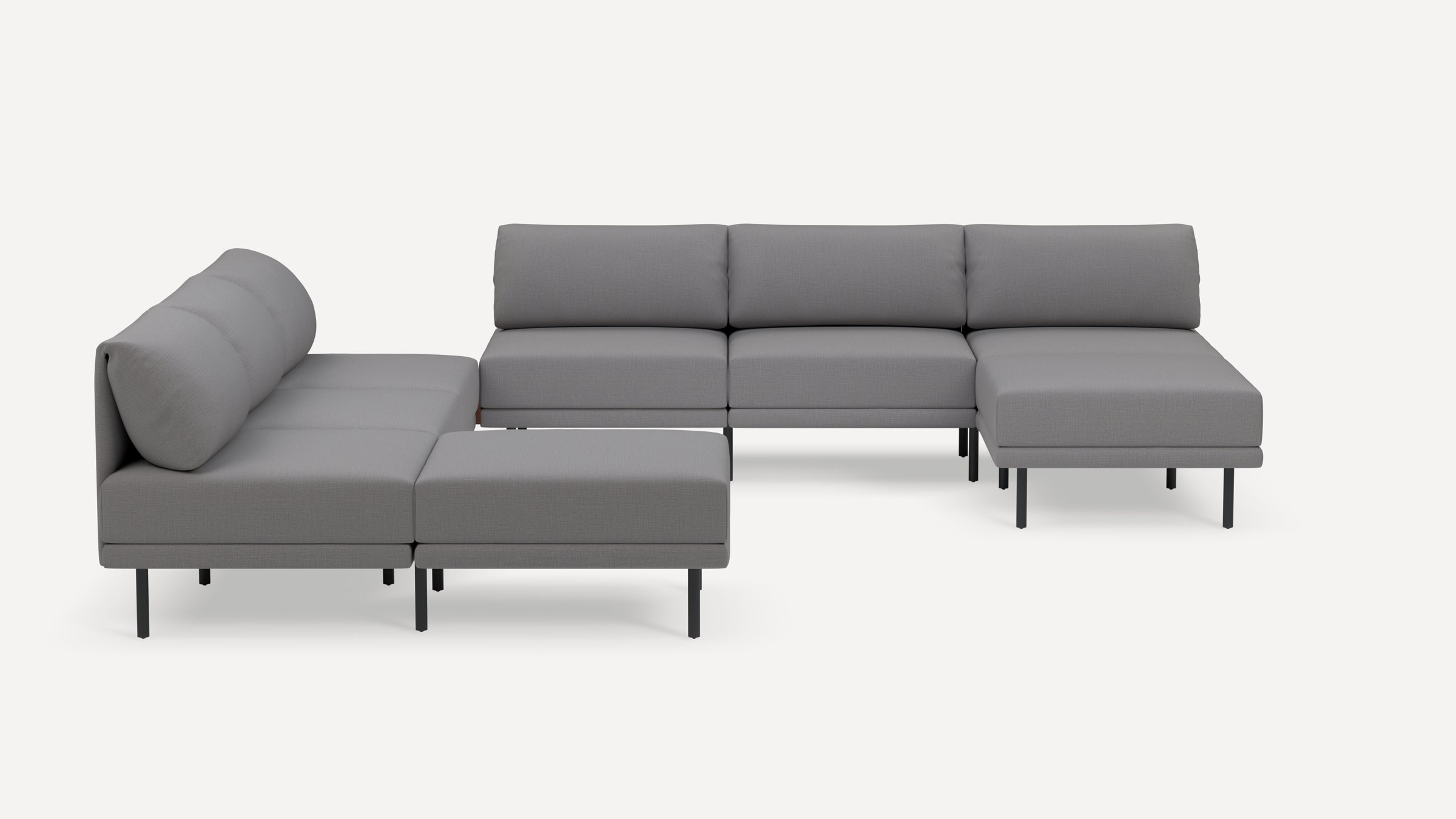 Modern L-shaped sectional sofa in light gray fabric with metal legs, featuring cushioned backrests and sleek, minimalist design.