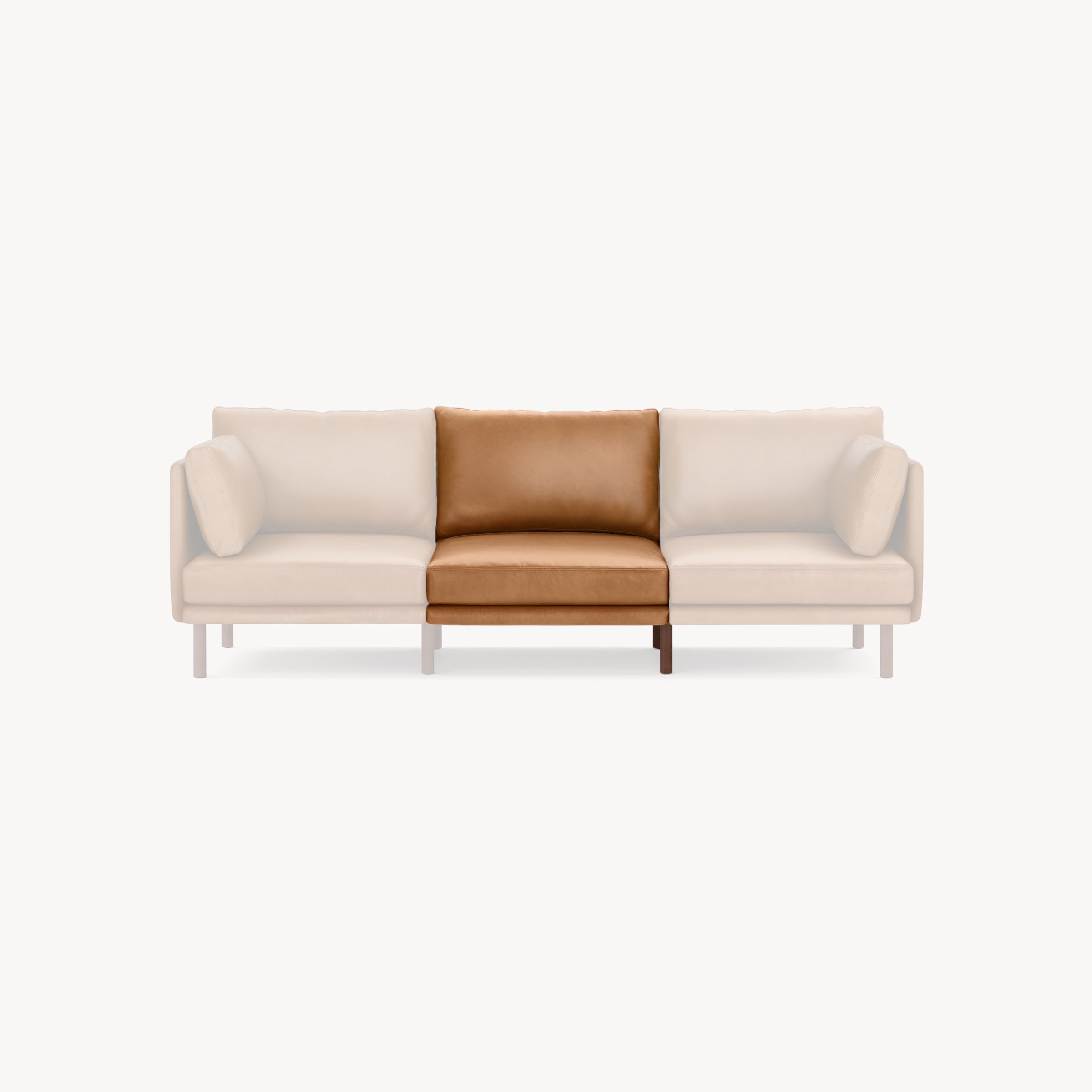 Modern three-seat sofa with a single brown leather cushion in the center and light beige fabric cushions on the sides.