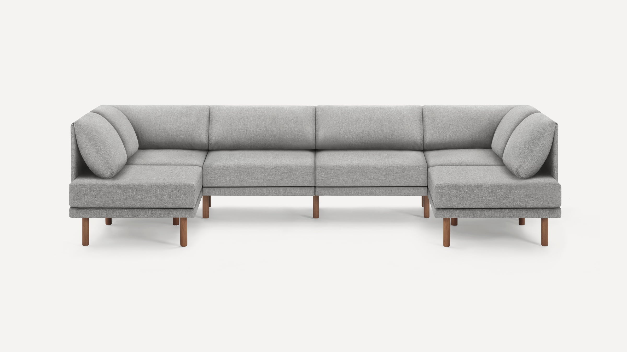 Modern light gray L-shaped sectional sofa with wooden legs and cushioned backrest and armrests.