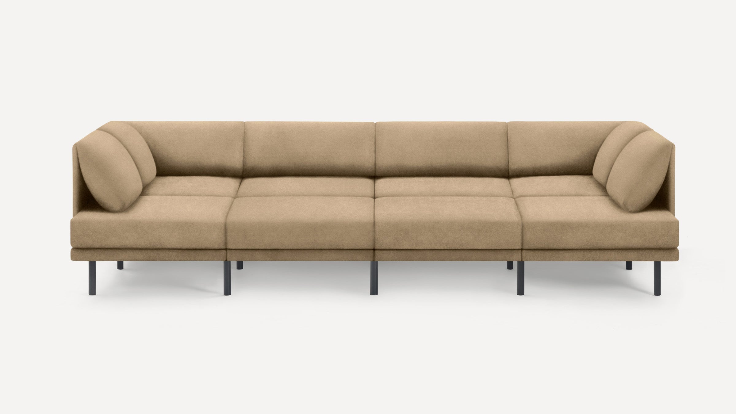 Modern beige sectional sofa with clean lines, cushioned backrests, round armrest pillows, and black metal legs.